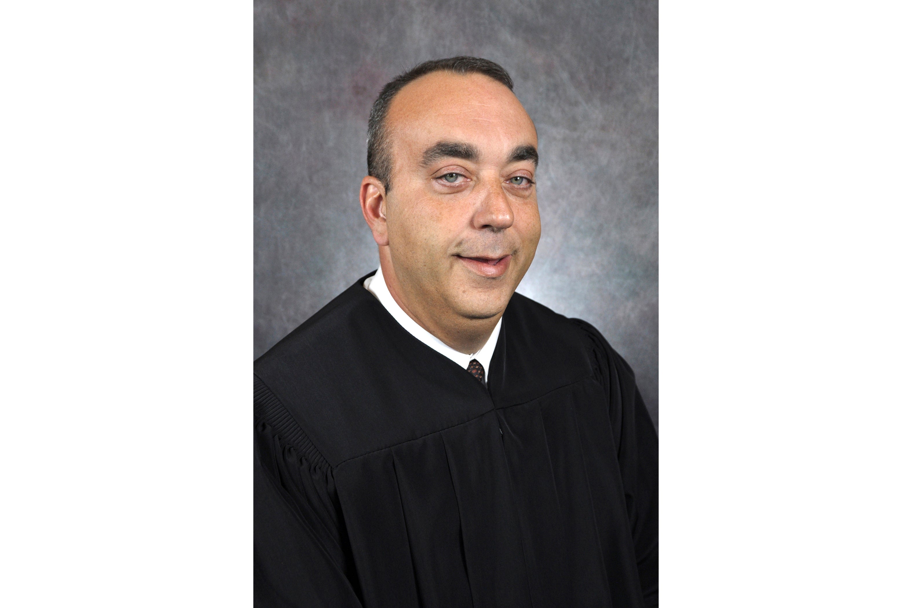 District Judge Kevin Mullins, 54, was pronounced dead on the scene.