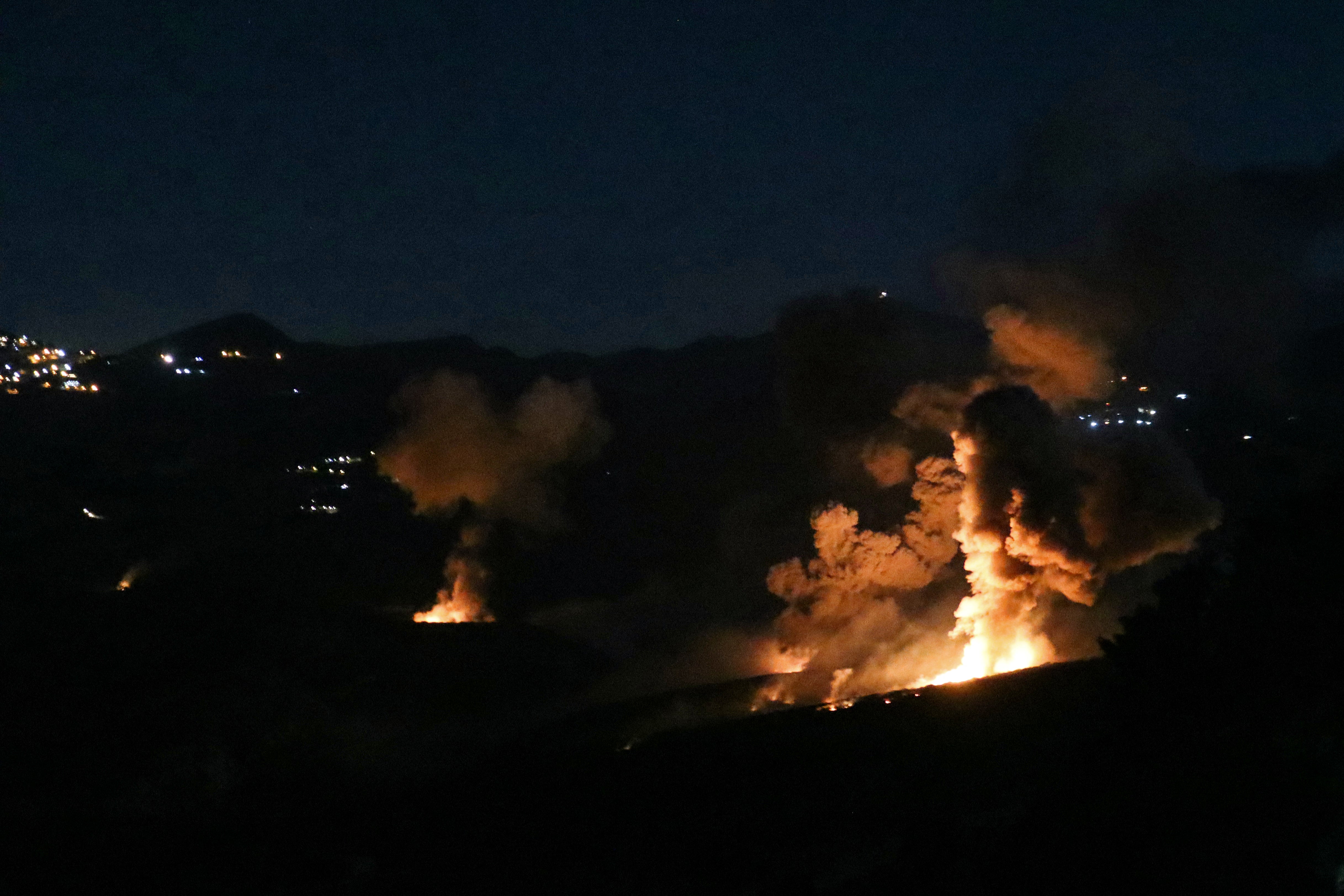 Smoke and fire rise from the site of an Israeli strike on the southern Lebanese border village of Mahmoudiyeh on 19 September 2024