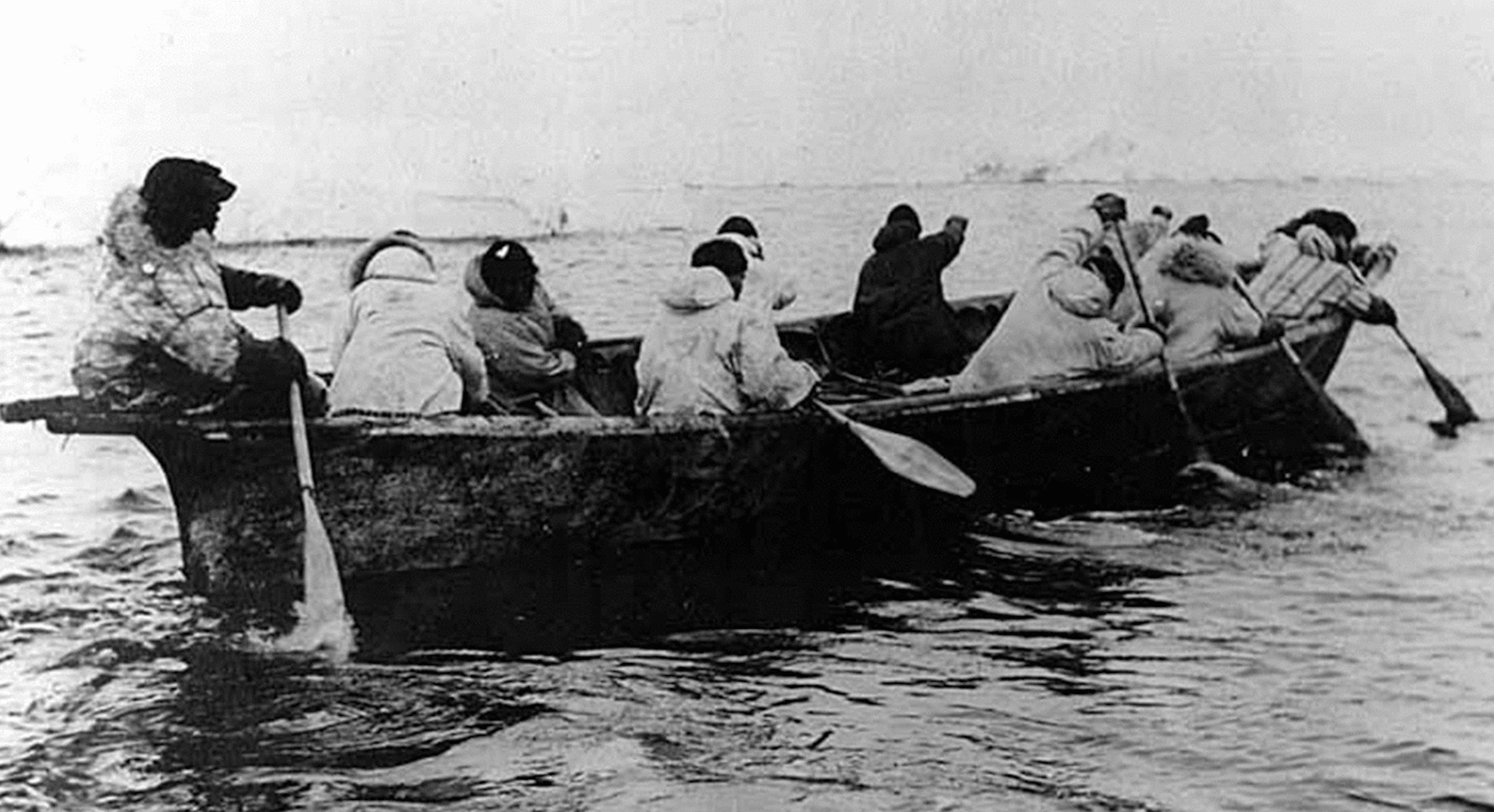 Photo of Umiak skin boat paddled by Kingikmiut whale hunters in Cape of Prince Wales, Bering Strait