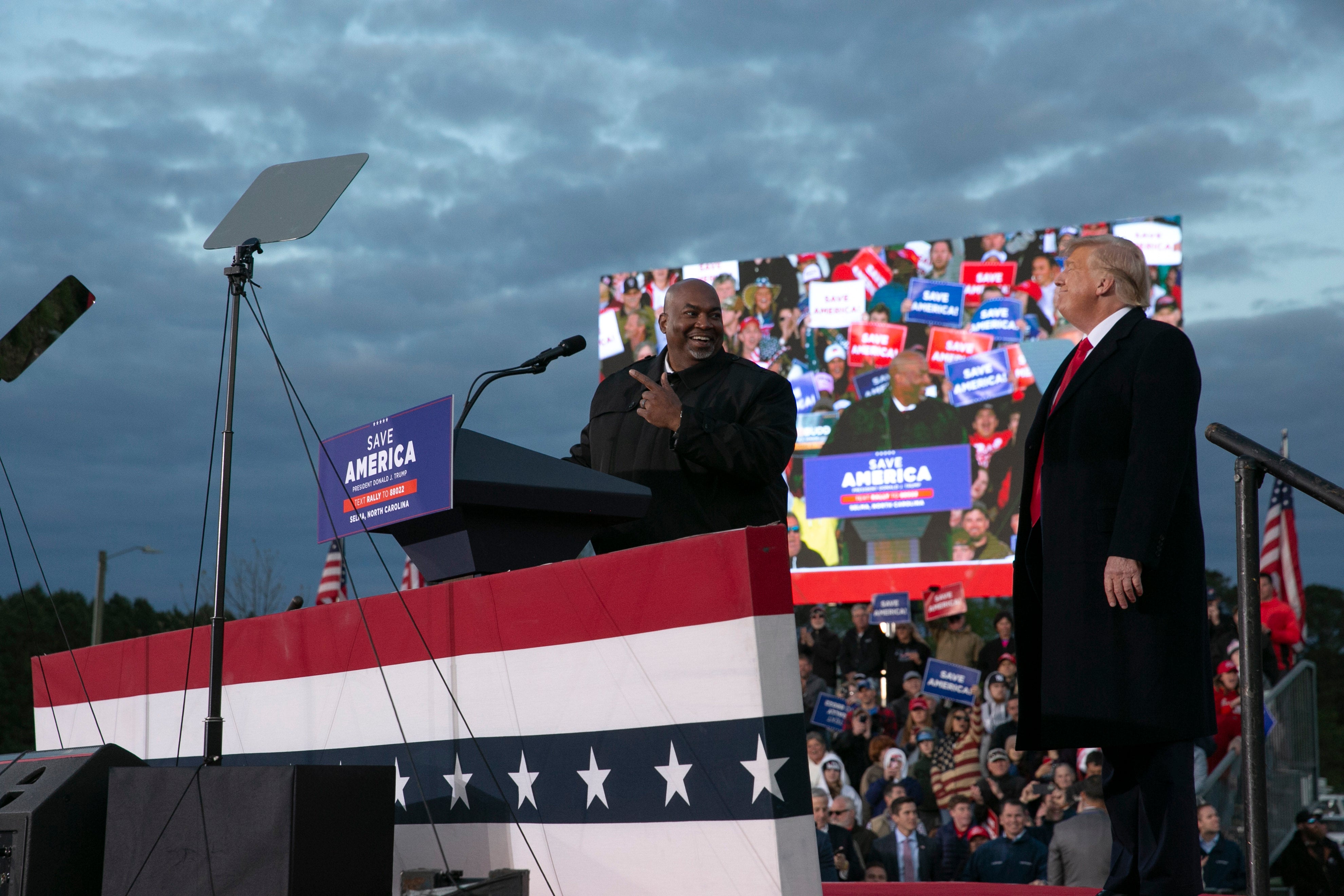 Robinson is seen on stage with Donald Trump in 2022. The Harris campaign moved fast to try to link Trump to Robinson after the CNN revelations, sharing footage on social media of Trump praising his fellow Republican.