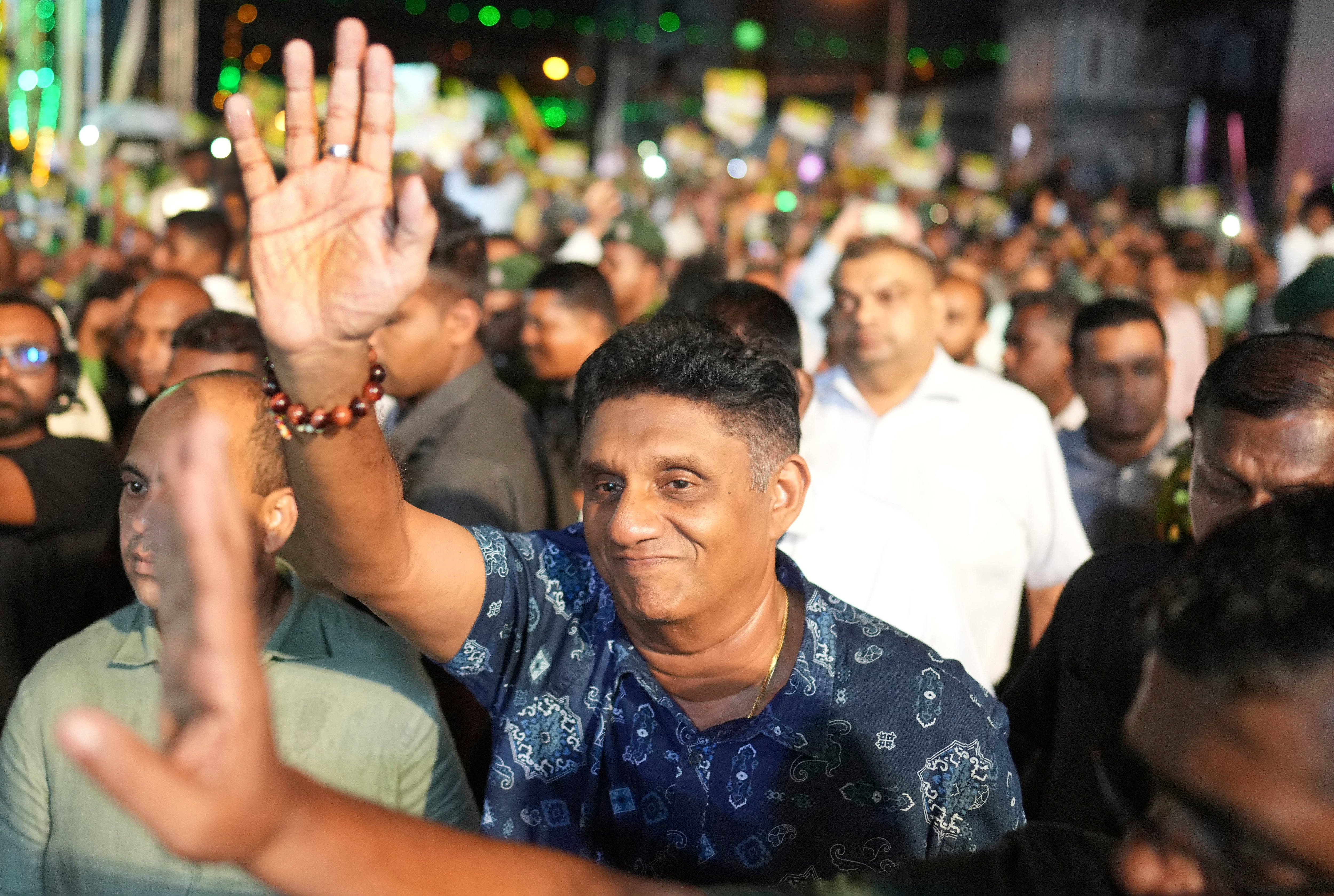 Presidential candidate and opposition leader Sajith Premadasa arrives at the final rally before the presidential elections