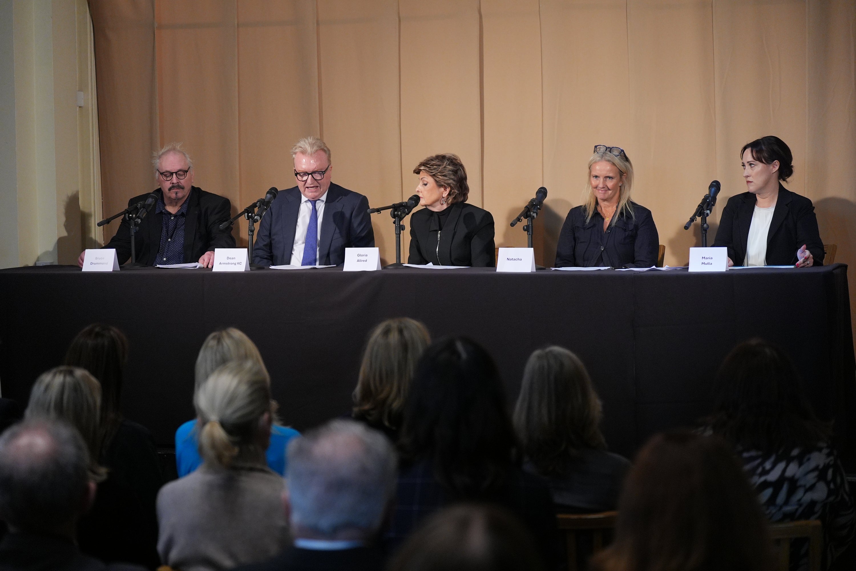 The legal team during a press conference to discuss their involvement in the investigation and the legal claim against Harrods