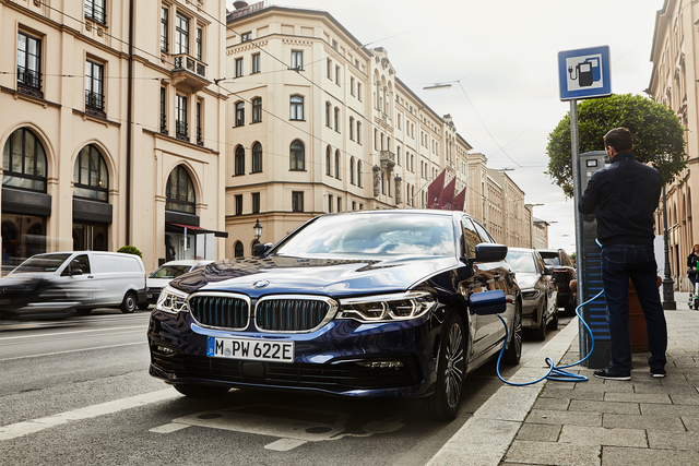 <p>Campaigners want to see a reduction on VAT for public chargers to match at-home charging costs. Pictured: the BMW 530e</p>