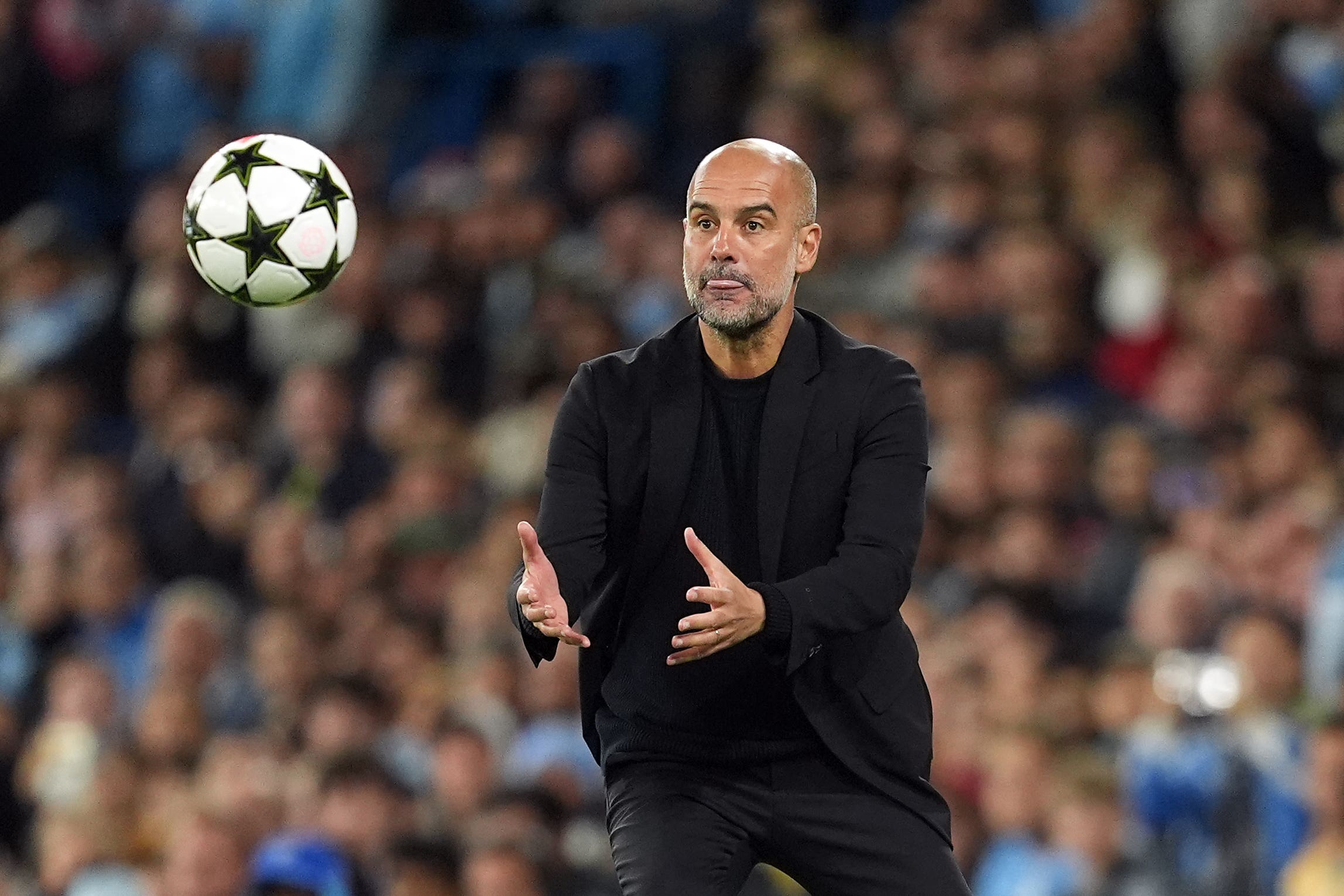 Pep Guardiola is happy to have the benefit of this week’s Champions League schedule (Martin Rickett/PA)