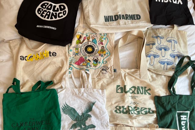 <p>A lot of baggage: Kate Ng’s collection of tote bags runs the gamut of coffee shops, pubs, and eyewear brands </p>