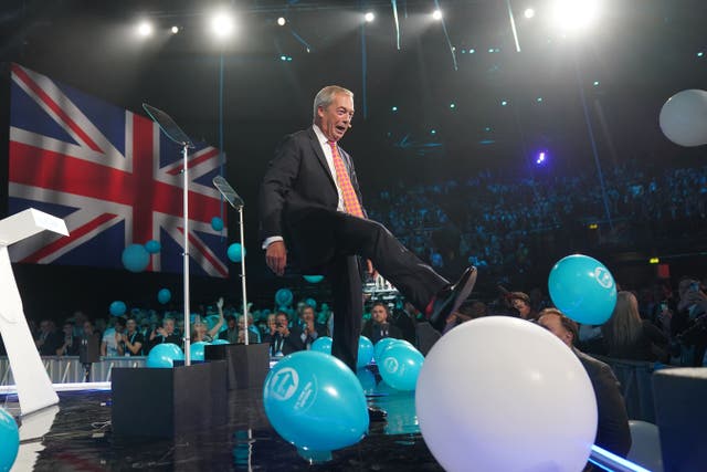 Reform UK leader Nigel Farage speaking during the party’s annual conference at the National Exhibition Centre in Birmingham (Joe Giddens/PA)