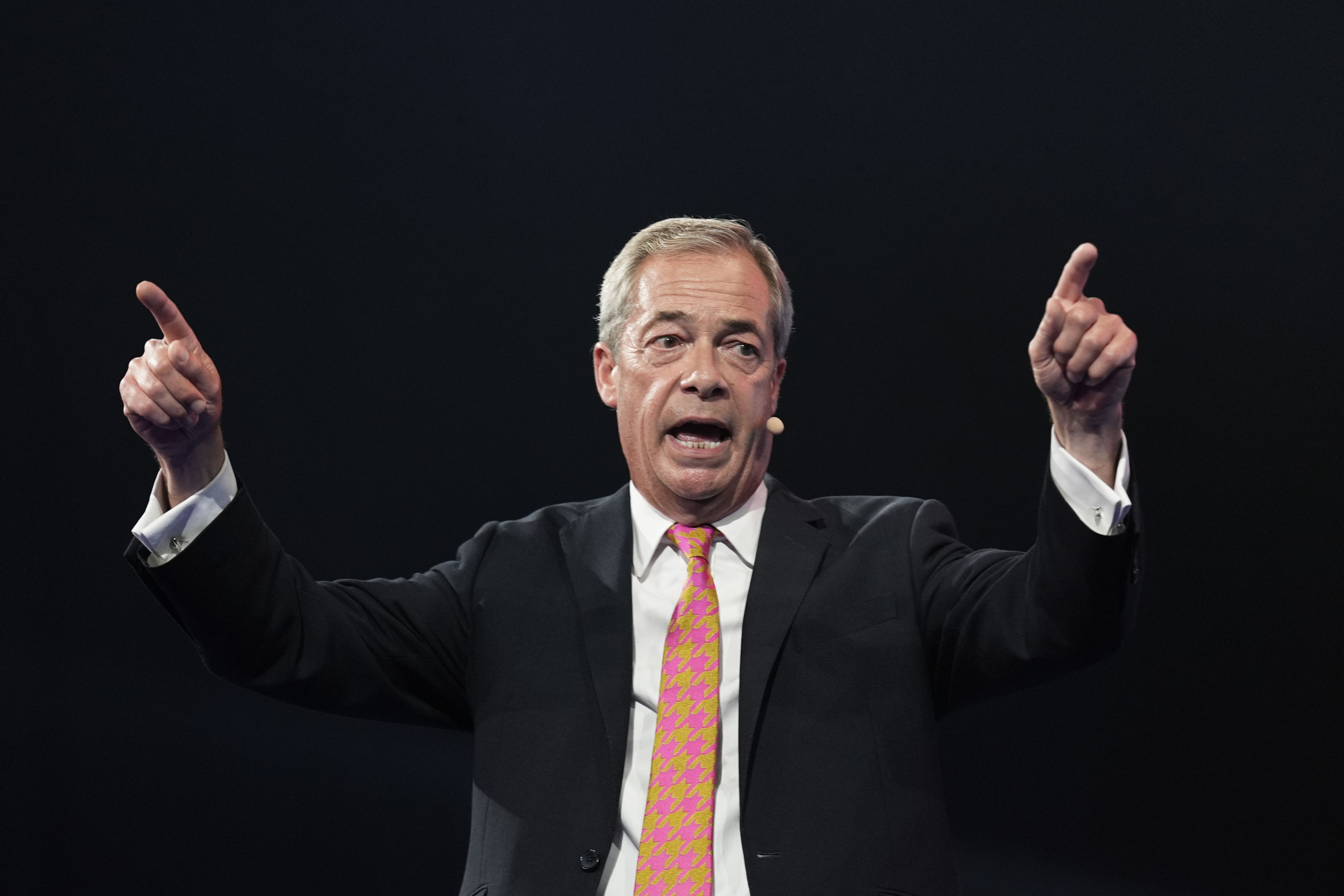 Reform UK leader Nigel Farage speaking during the party’s annual conference at the National Exhibition Centre in Birmingham (Joe Giddens/PA)