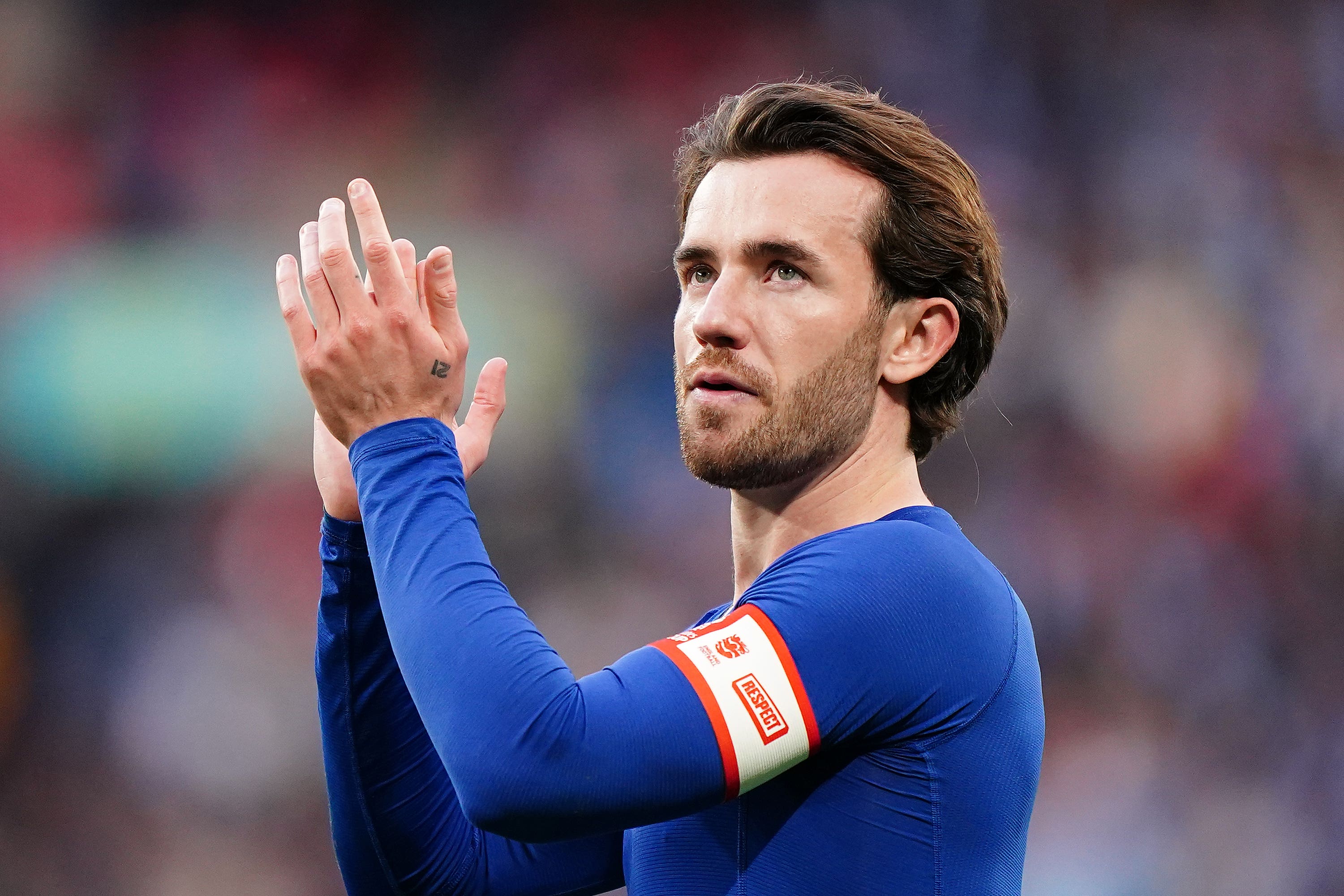 Ben Chilwell applauds Chelsea fans.