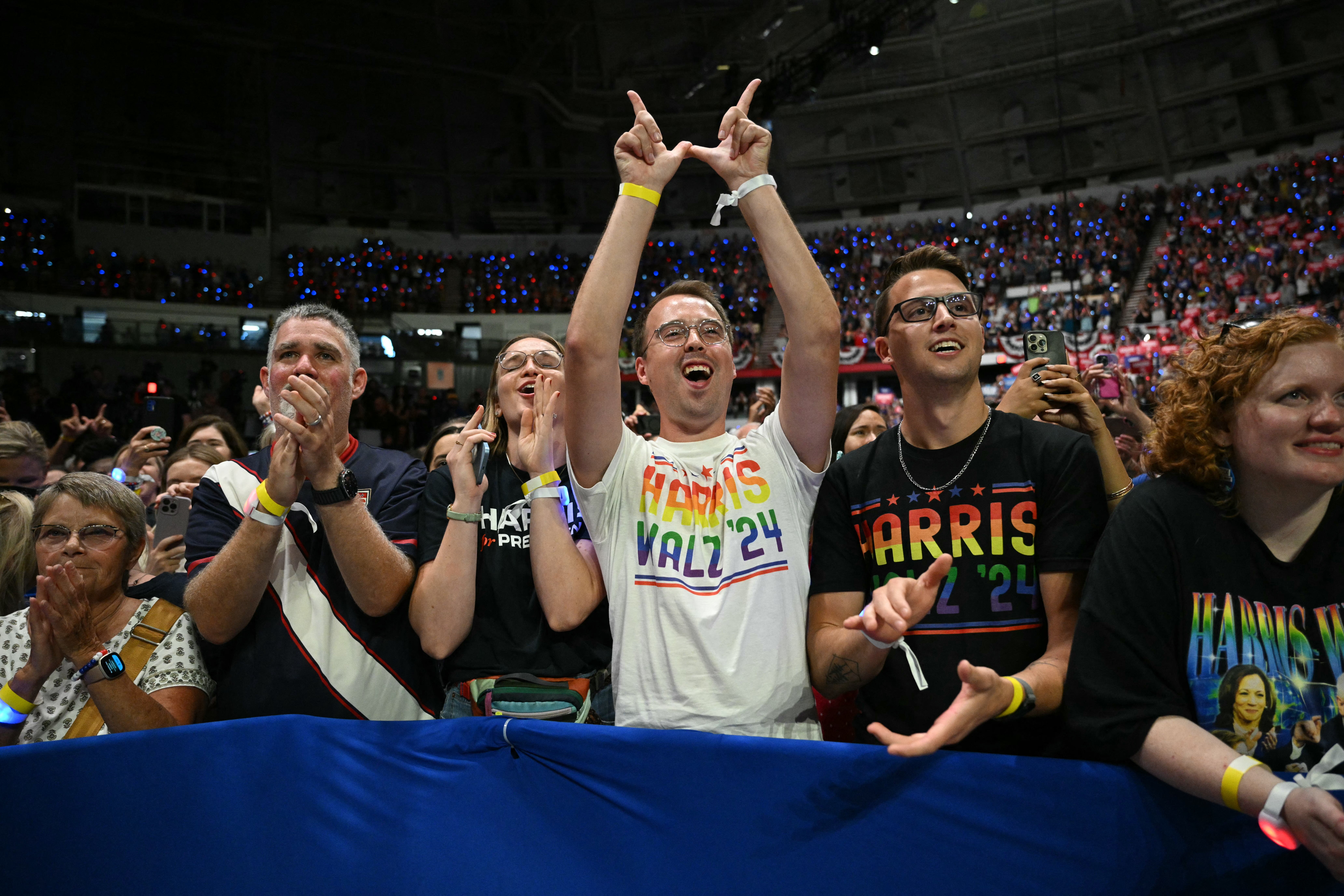 Attendees cheer as US Vice President and Democratic presidential candidate Kamala Harris speaks at a campaign event at Alliant Energy Center in Madison, Wisconsin, on September 20, 2024