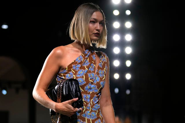 Fresh florals and pastels were a new direction for Versace, modelled on the catwalk by Gigi Hadid (Antonio Calanni/AP)