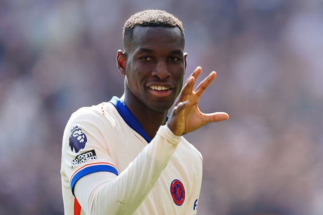 <p>All smiles for Chelsea’s Nicolas Jackson as he celebrates the opening goal (PA)</p>