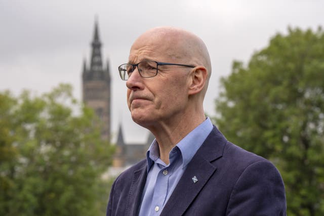 First Minister John Swinney was in Glasgow on Saturday (Jane Barlow/PA)