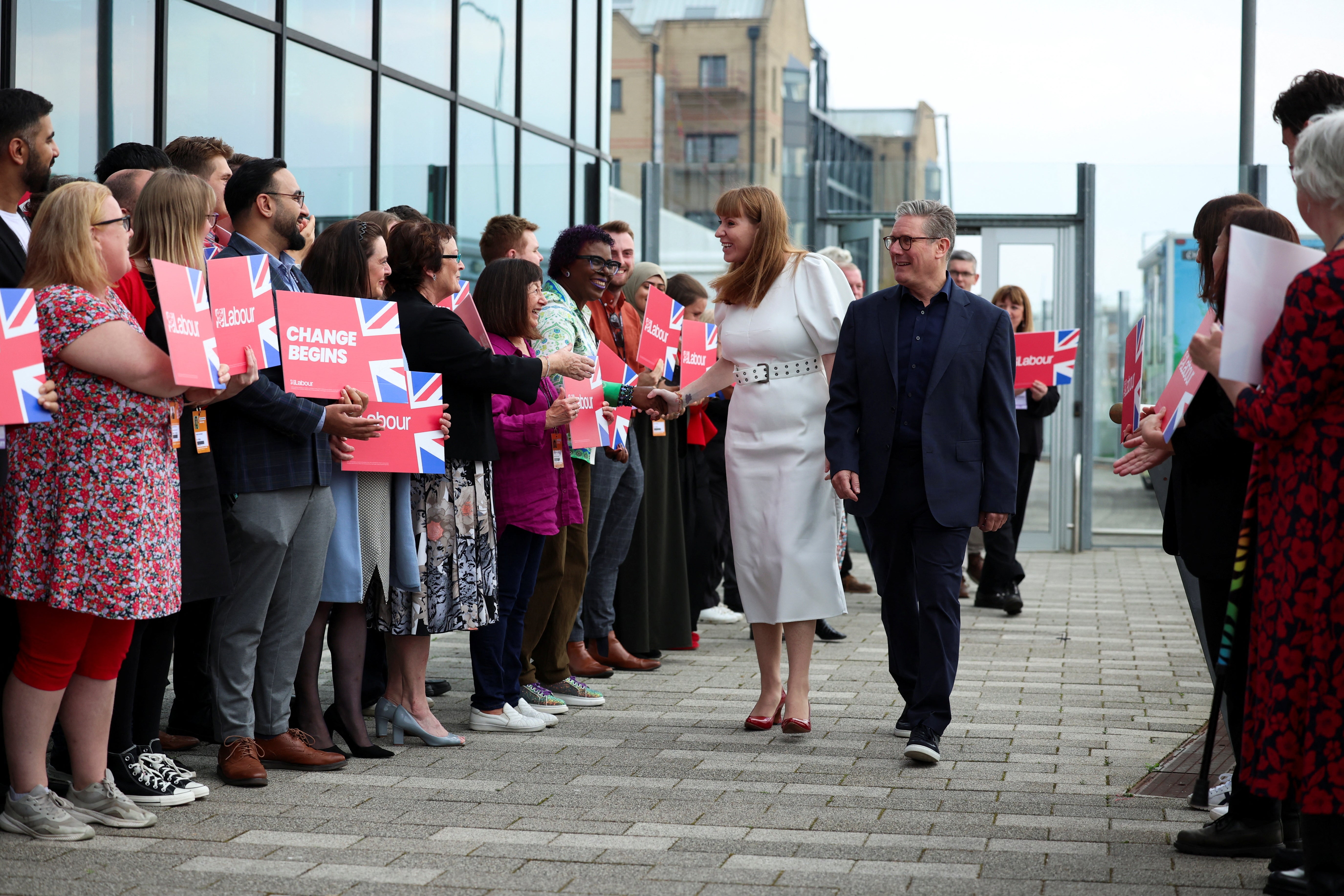 Sir Keir and Ms Rayner were met by a small group of cheering activists ahead of the formal start of the Labour conference on Sunday