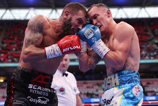 <p>Anthony Cacace and Josh Warrington battle at Wembley Stadium</p>