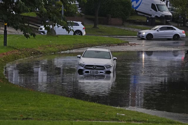 A car in flood water on Aldridge Road in Perry Bar, Birmingham (Nick Potts/PA)