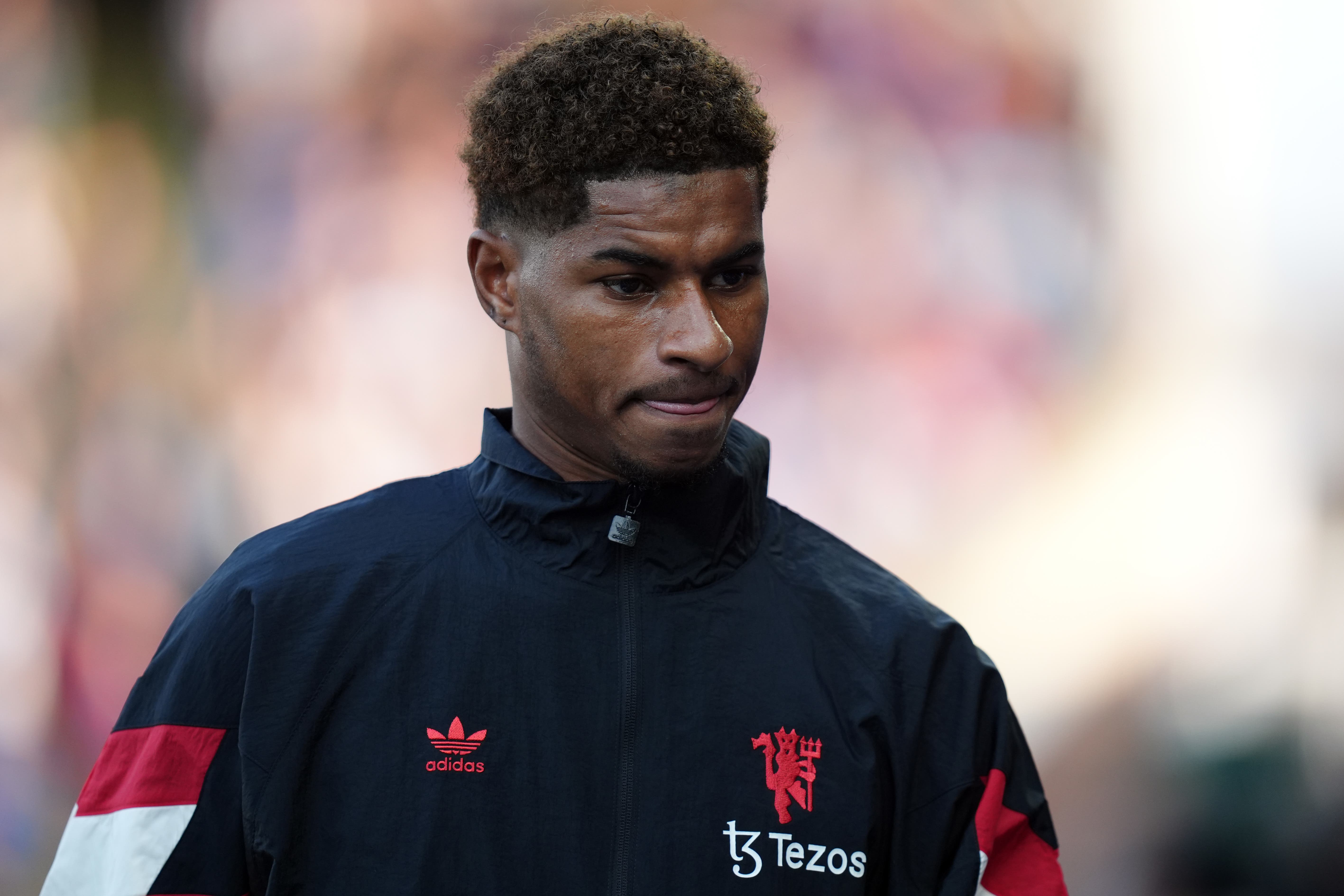 Marcus Rashford started the game on the bench (John Walton/PA)