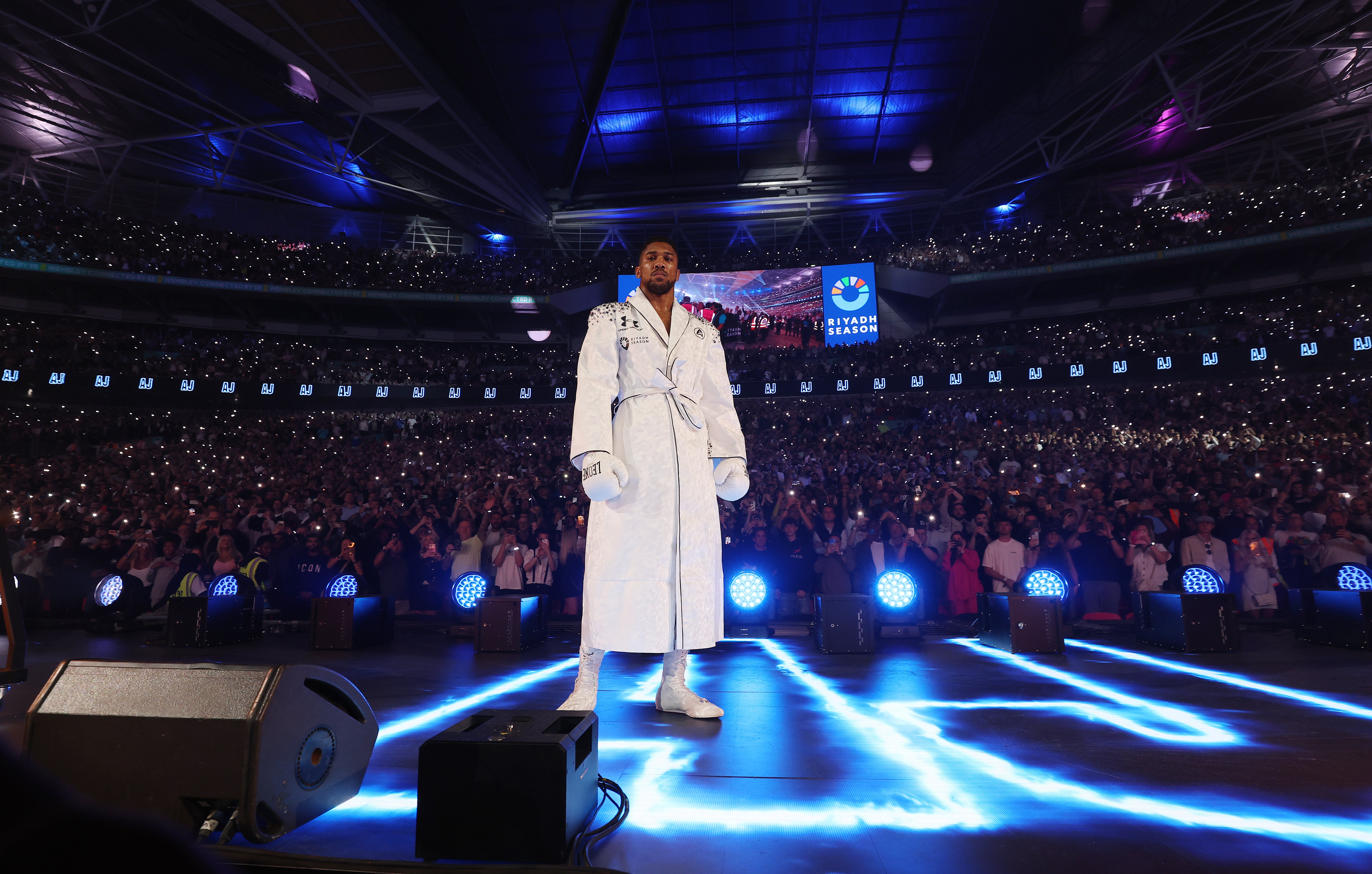 Anthony Joshua arrived wearing a white gown