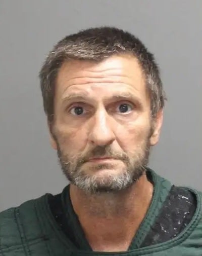 Timothy Ernest Legard is accused of killing his neighbor and then sexually abusing the victim's wife and daughter.