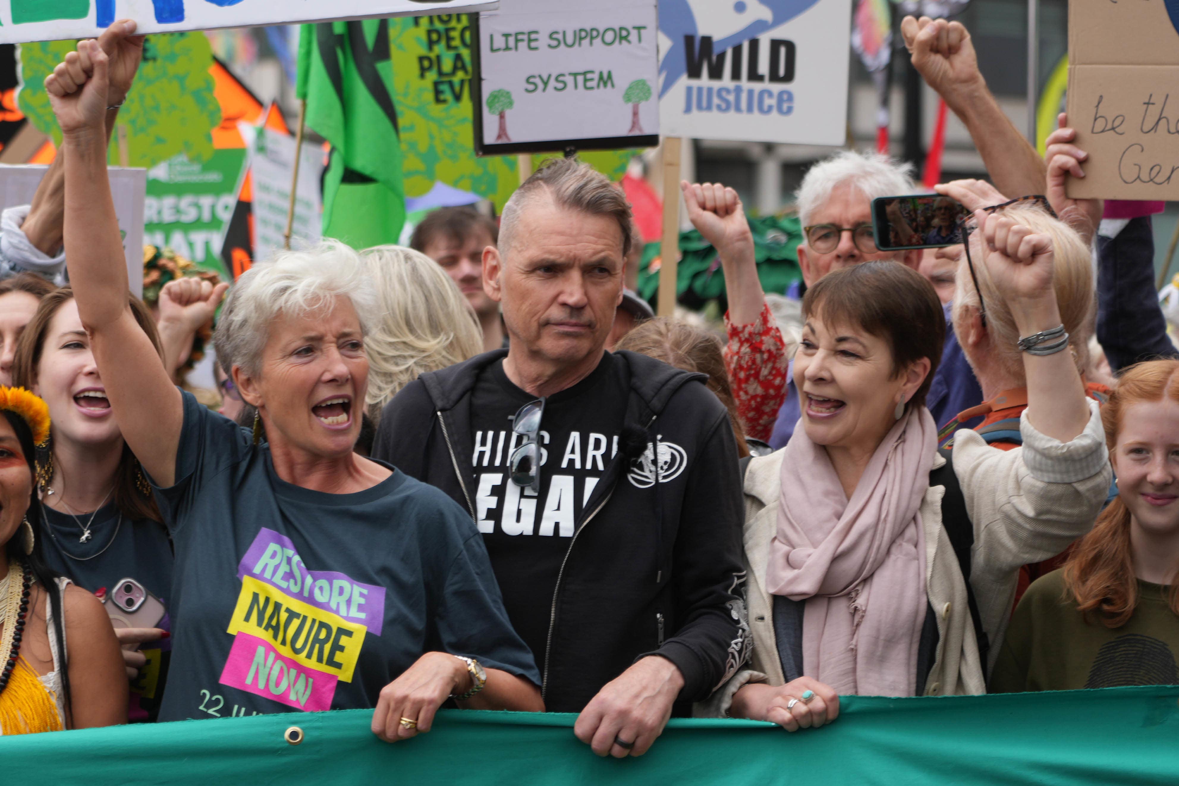 Dale Vince (centre) joins Dame Emma Thompson (left) and Caroline Lucas (right) during a Restore Nature Now protest in central London in 2024 (Jeff Moore/PA)