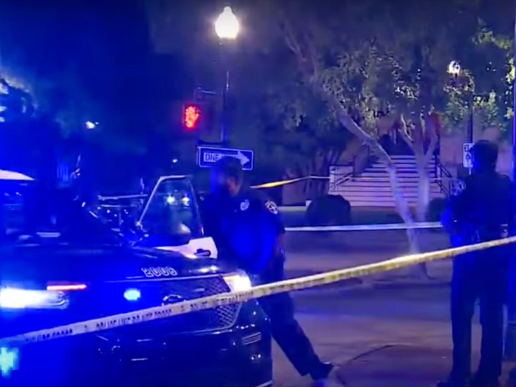 Police on the scene of a mass shooting in Birmingham, Alabama on Saturday night. Investigators believe the gunmen were paid to kill an individual target