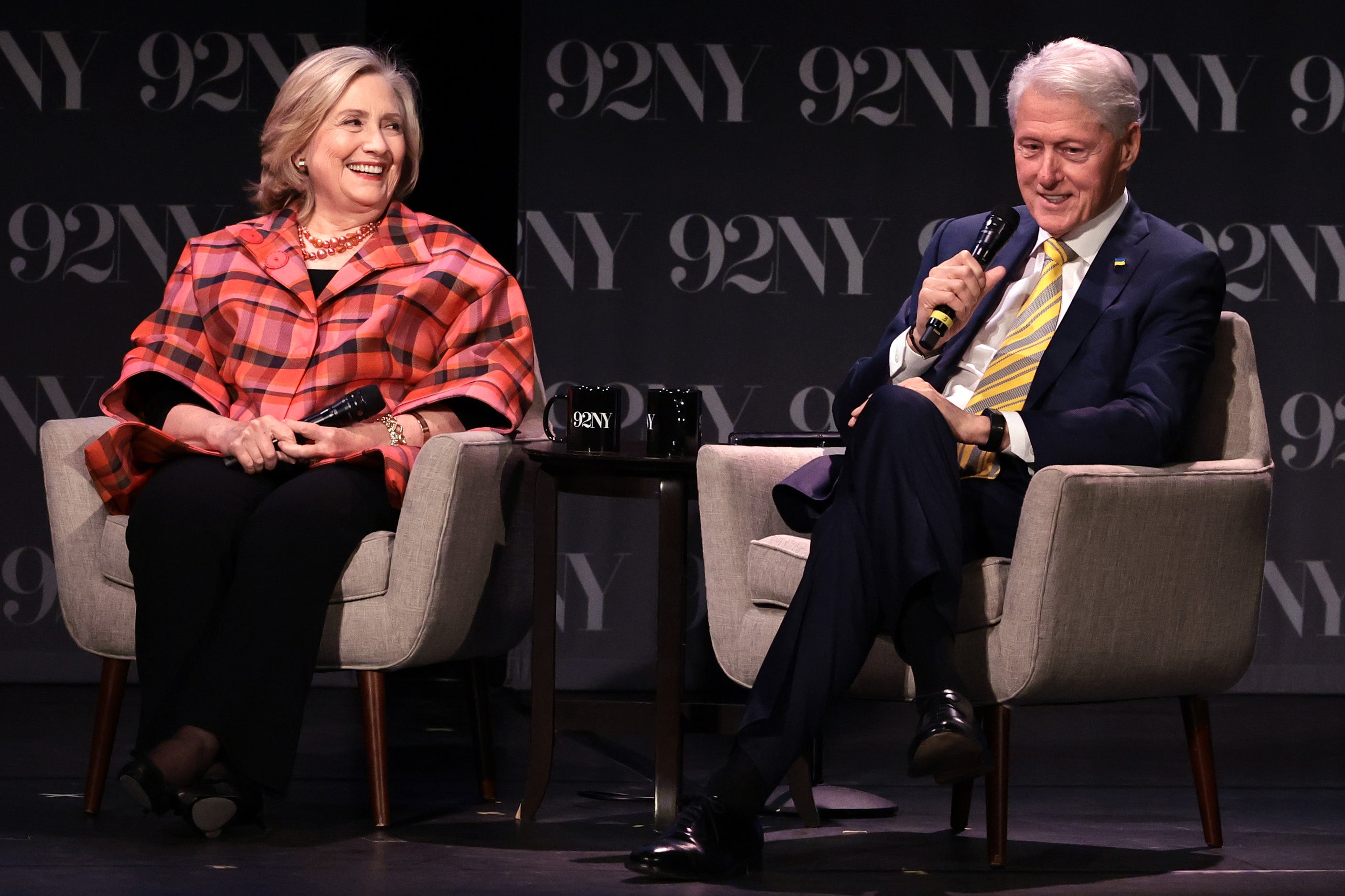 Secretary Hillary Rodham Clinton and President Bill Clinton speak onstage during In Conversation with David Rubenstein in New York City. Hillary has recently made rare comments about her marriage to Bill