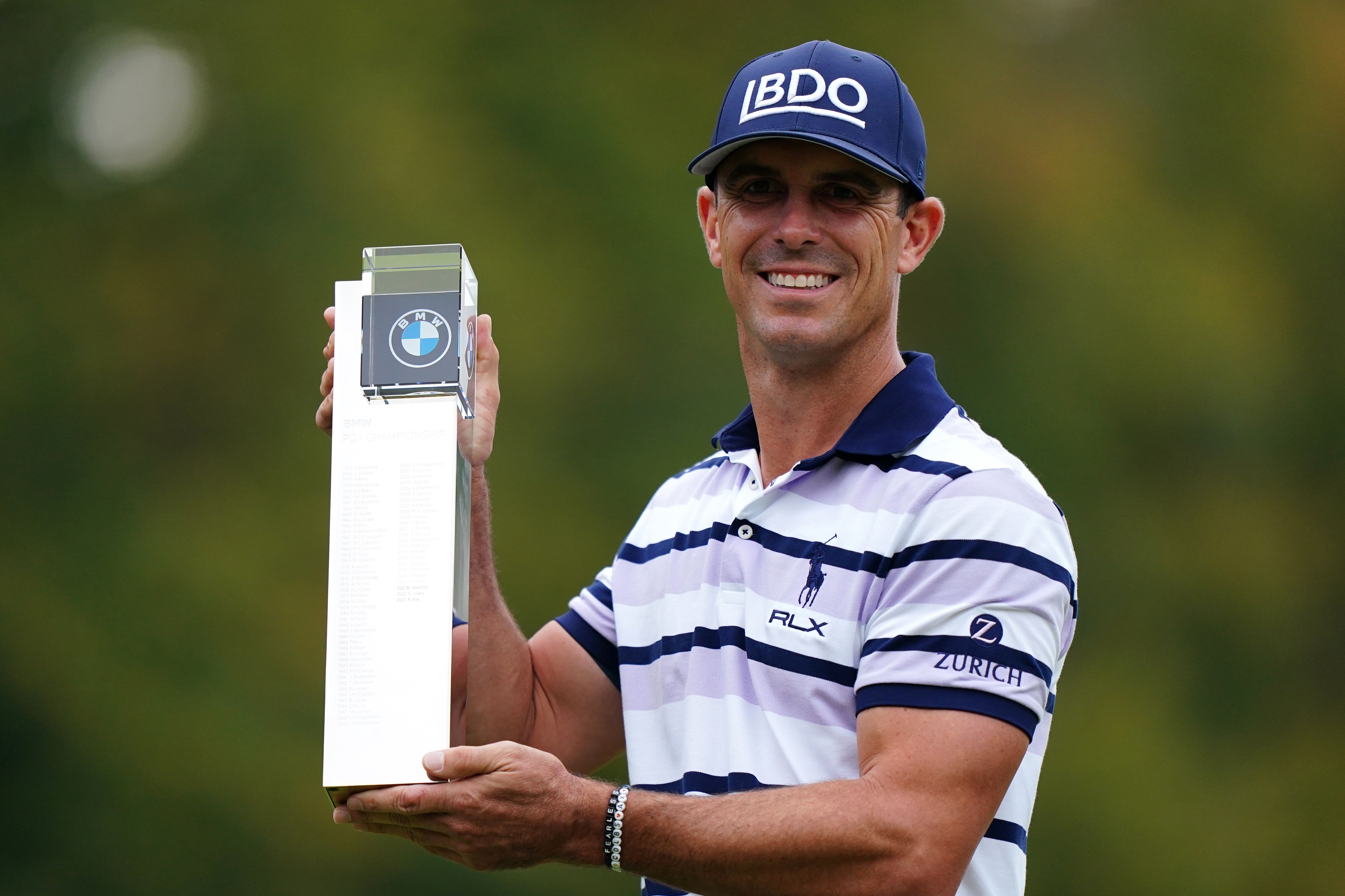 Billy Horschel lifts the trophy after beating Rory McIlroy in a play-off for the BMW PGA Championship (Zac Goodwin/PA)