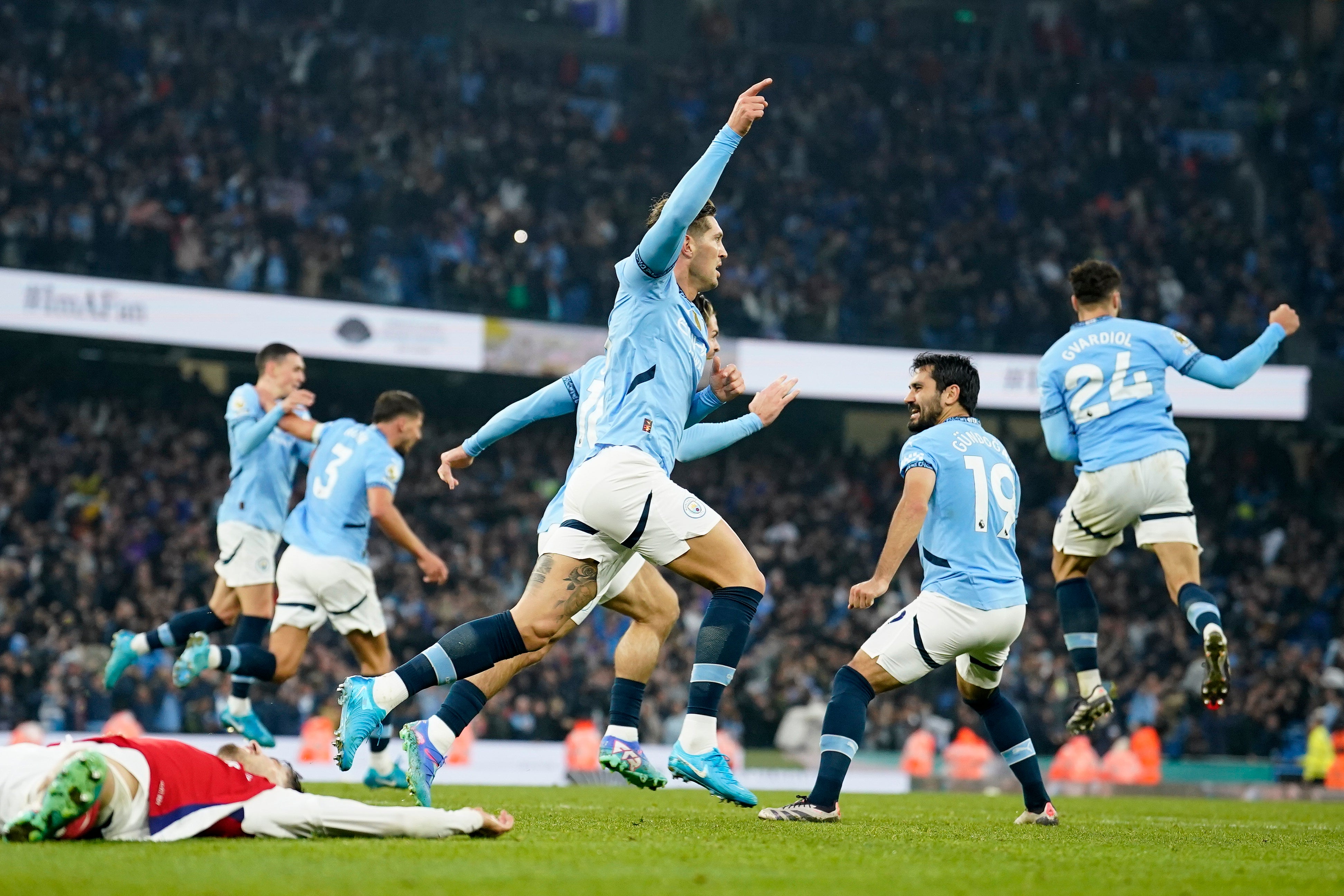 John Stones celebrates after scoring the equaliser for Manchester City