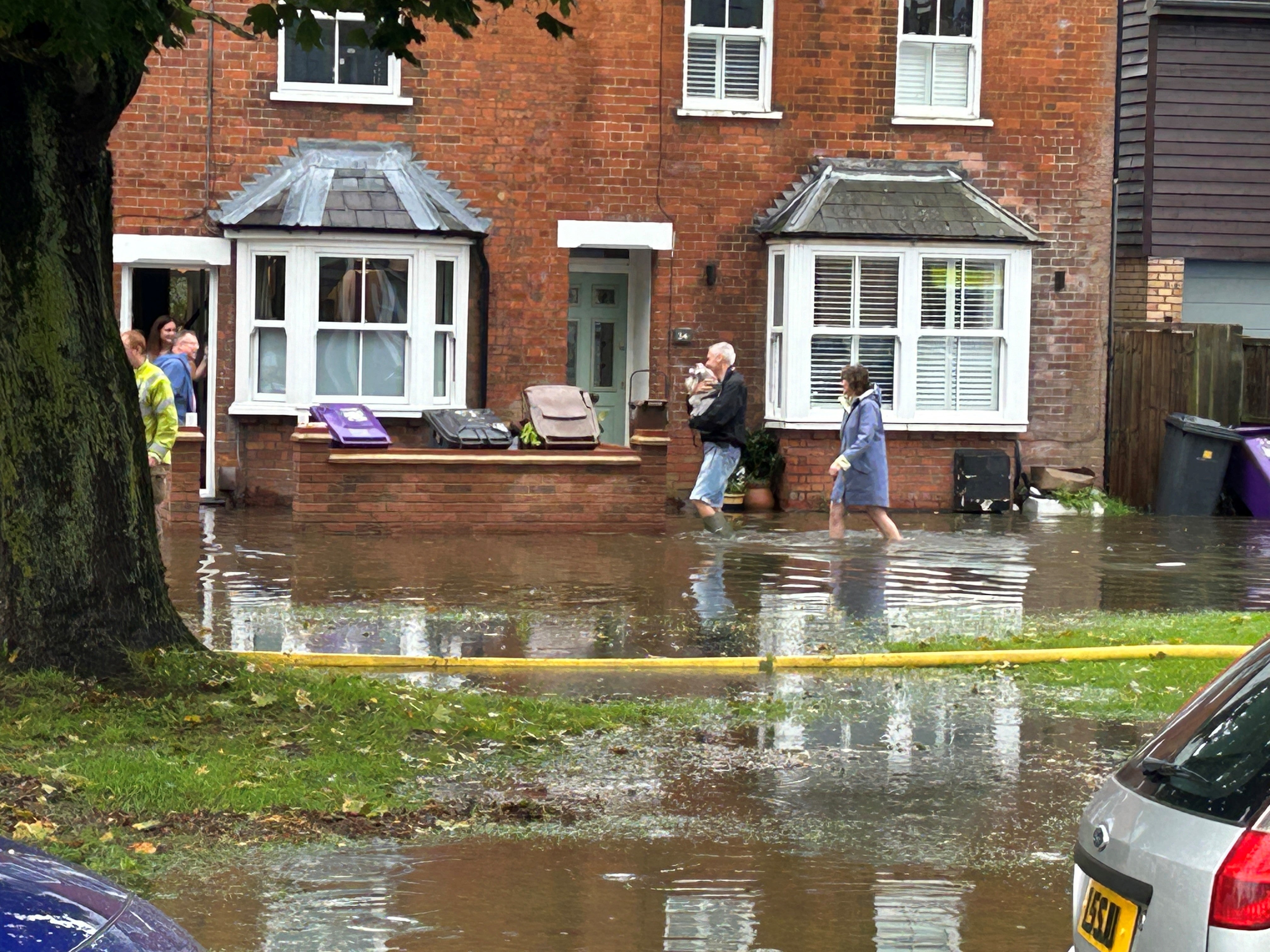 Homes are flooded on Woolgrove Road along the River Purwell in Hitchin