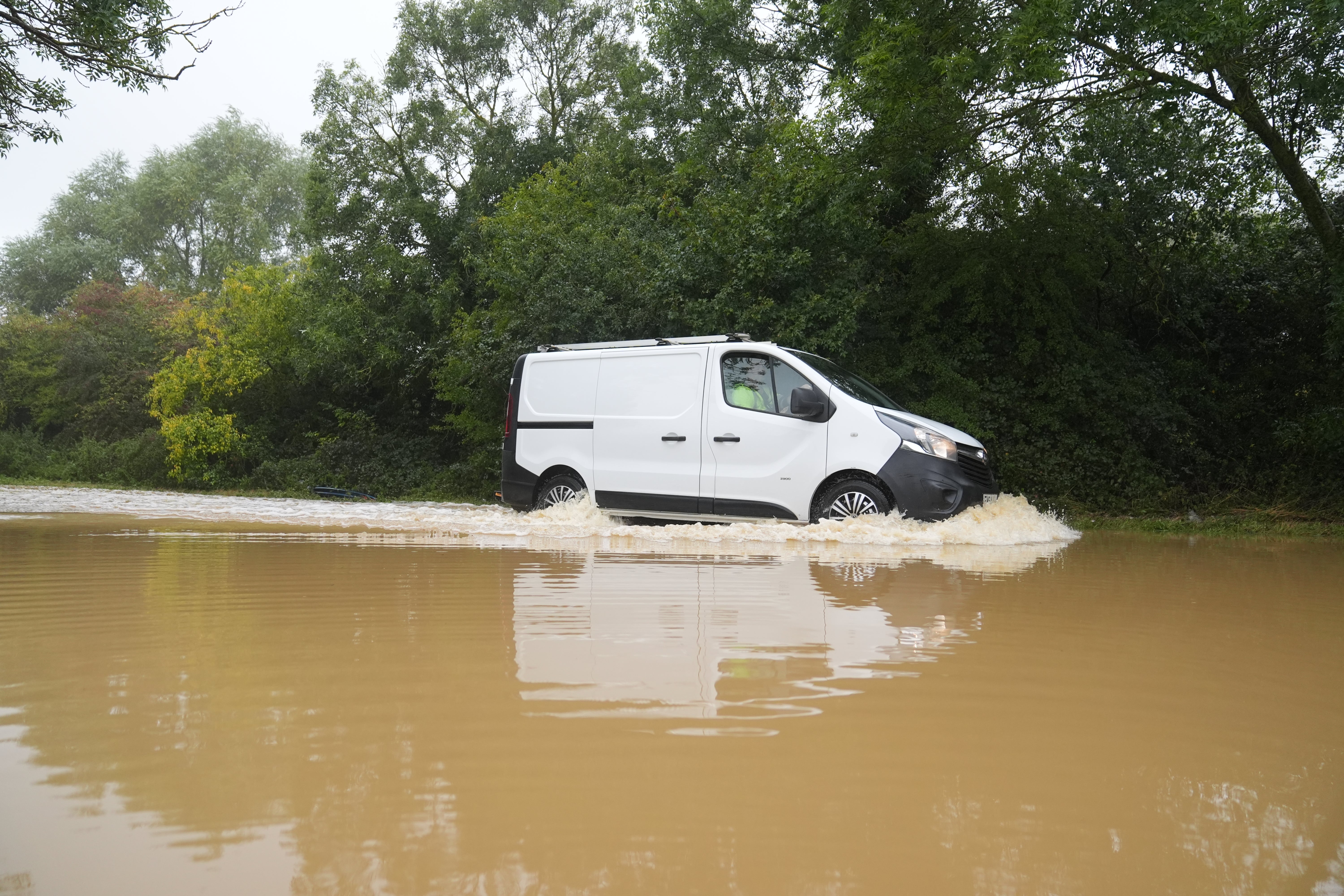 A van driving in flood water near Wellingborough