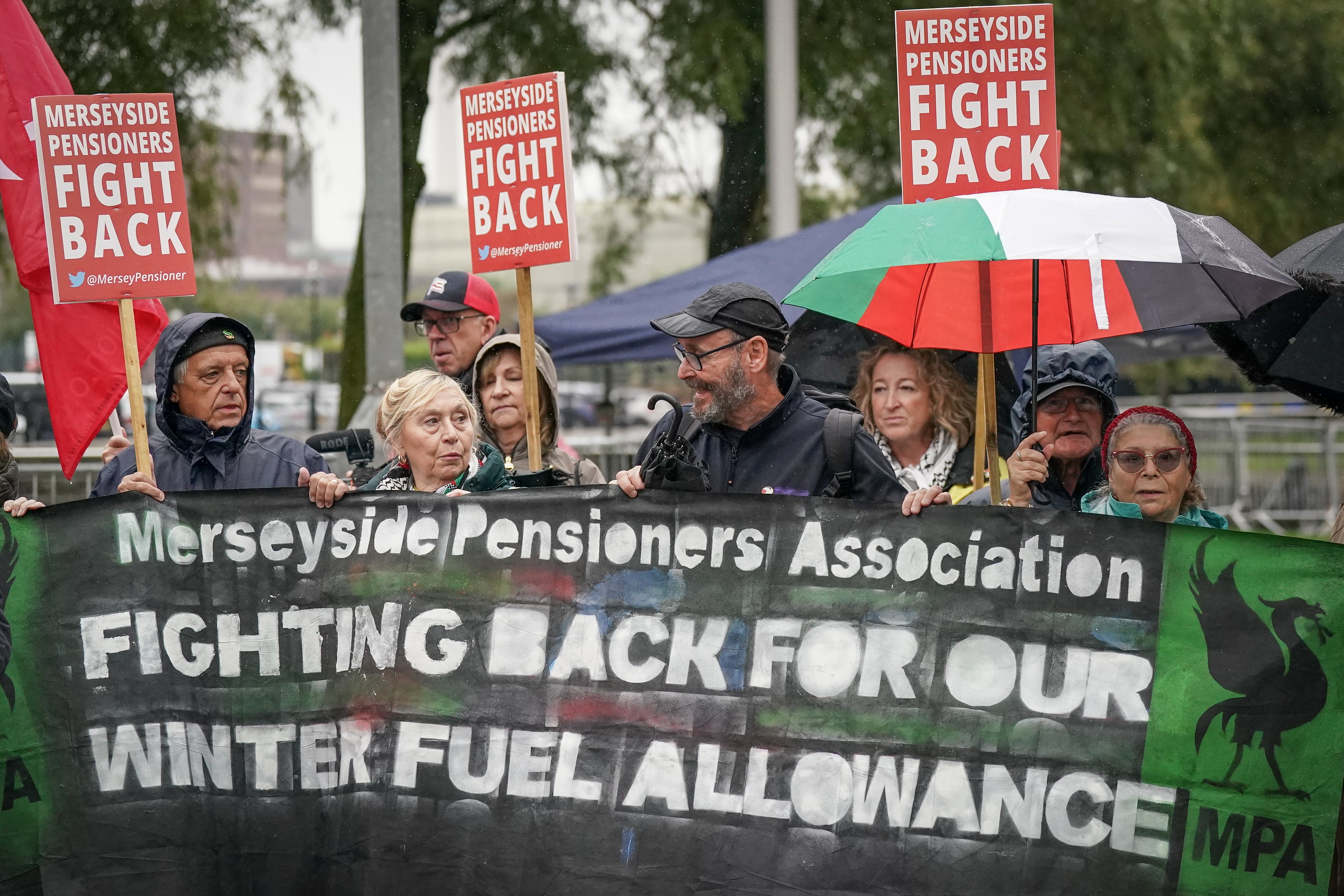 Protestors take part in a demonstration outside the Labour Party conference venue against the withdrawal of the winter fuel allowance