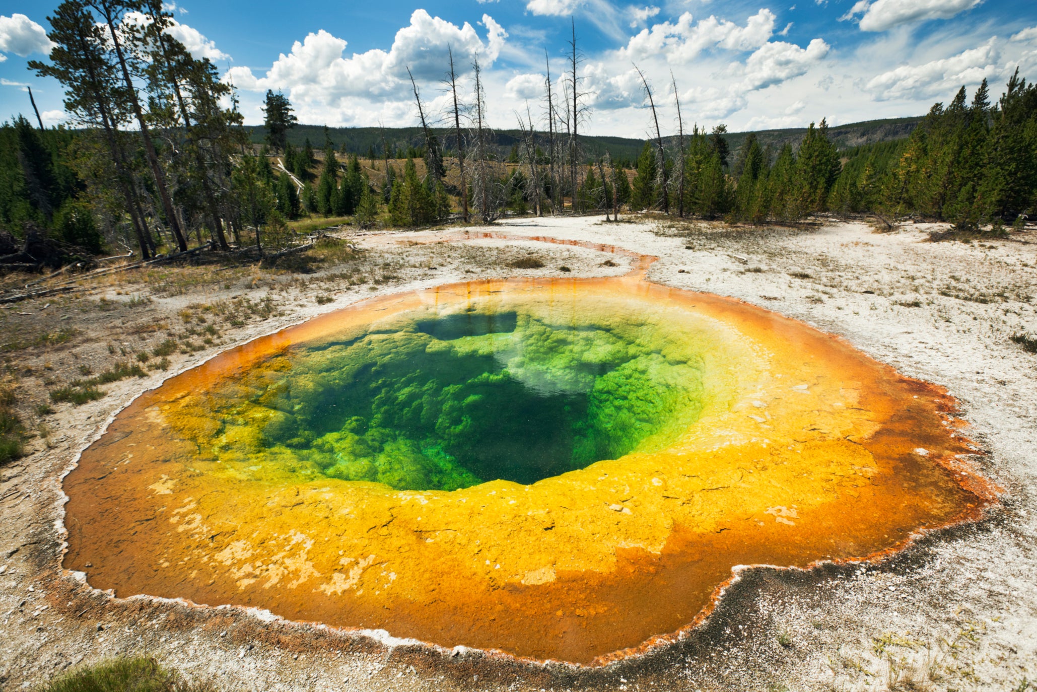 What the Morning Glory Pool looks like today, after hundreds of years of objects being thrown into the thermal water, changing the type of bacteria grown