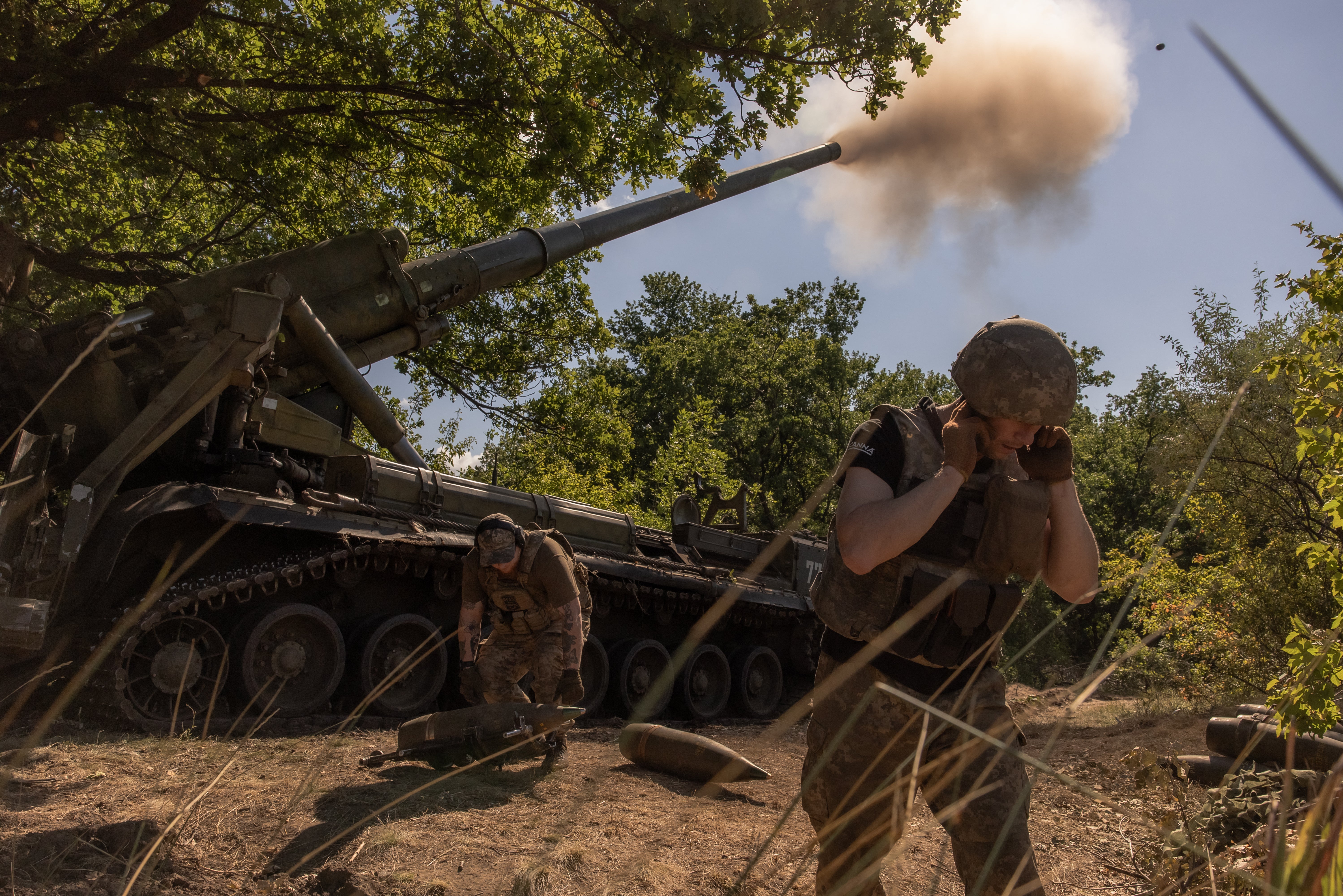 Ukrainian servicemen of the 43rd Artillery Brigade fire self-propelled artillery 2S7 Pion toward Russian positions, in an undisclosed area, in the Pokrovsk district