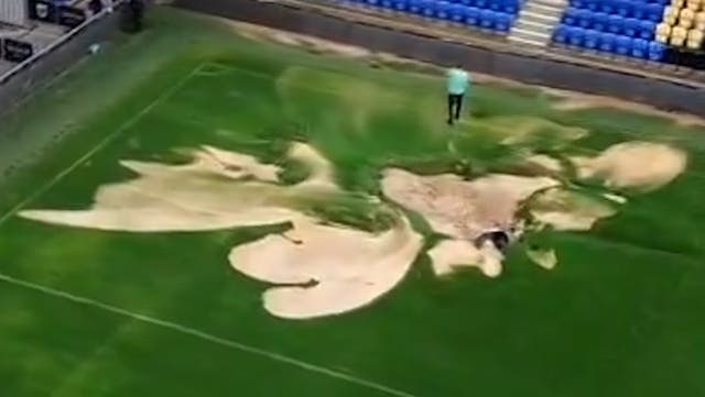 <p>‘Sinkhole’ opens up on AFC Wimbledon’s pitch.</p>