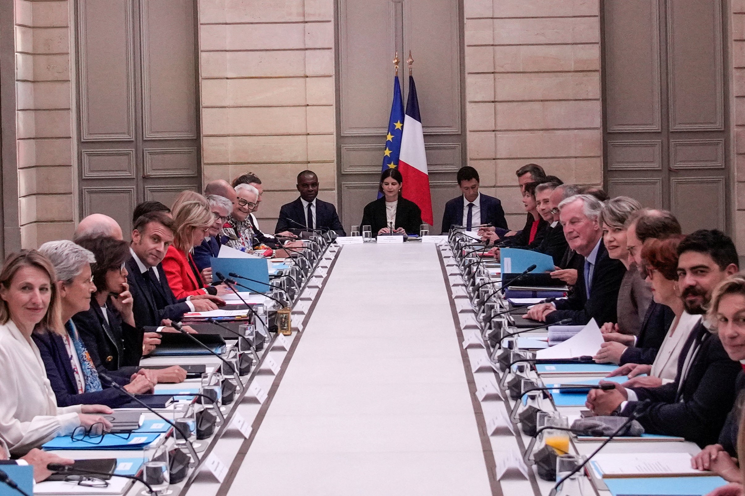 French president Emmanuel Macron and prime minister Michel Barnier meet with members of the new government