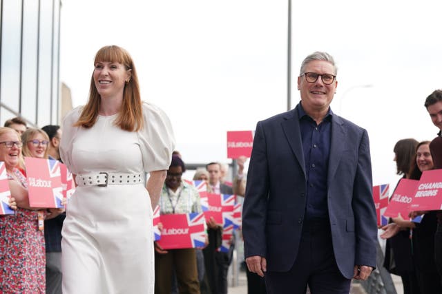 Angela Rayner walks with Sir Keir Starmer (Stefan Rousseau/PA)