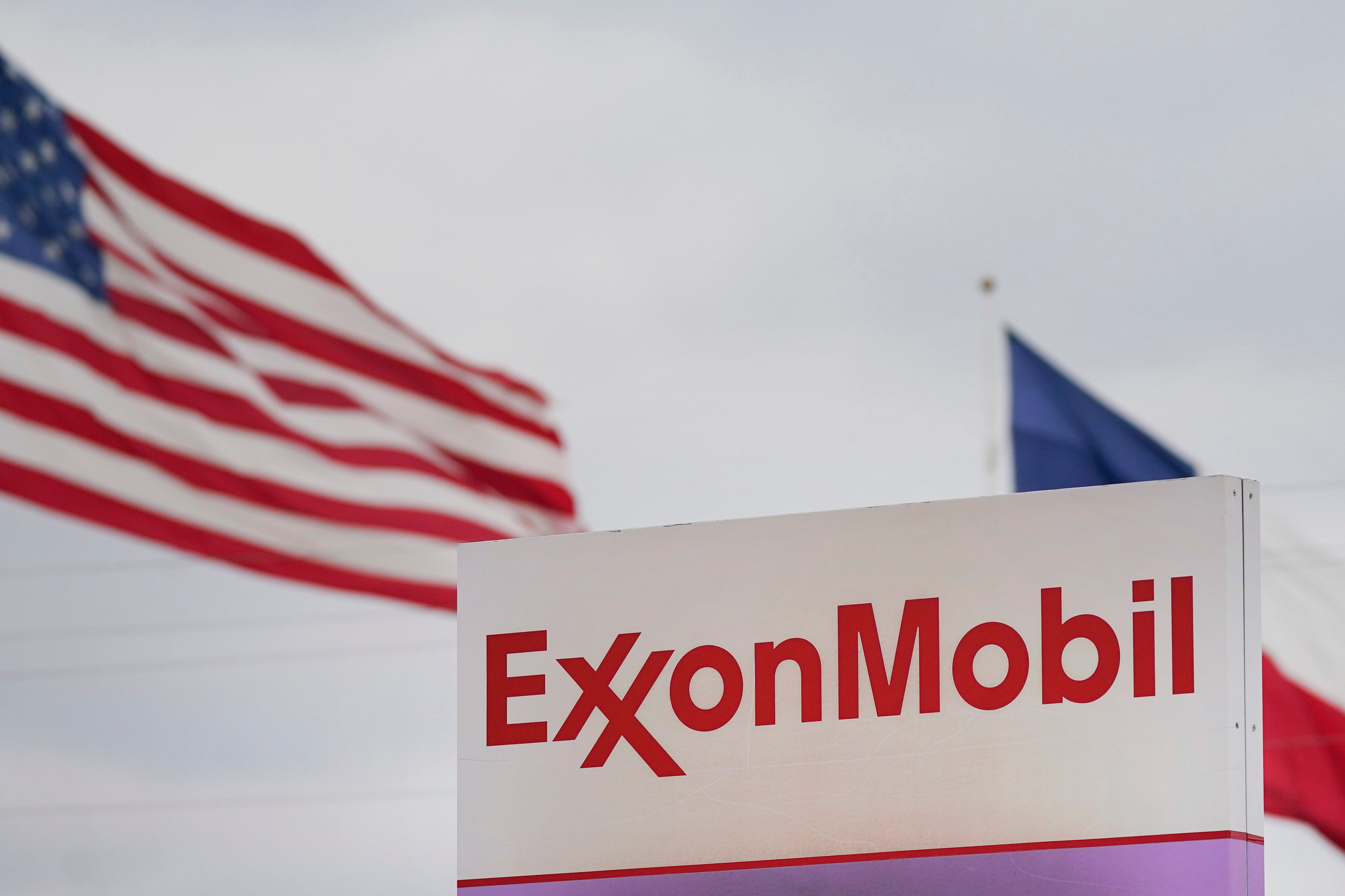 A Texas ExxonMobil fuel storage and distribution facility is pictured alongside an American flag in January of last year. ExxonMobil is being sued by California officials over its role in the global plastics pollution crisis. The state’s Department of Justice alleged that the corporation had misled its residents for half a century.