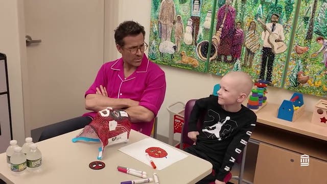 <p>Ryan Reynolds surprises young Deadpool fan battling cancer with special hospital visit.</p>
