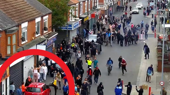 <p>Moment mother and daughter smash up car while on dog walk during riots.</p>