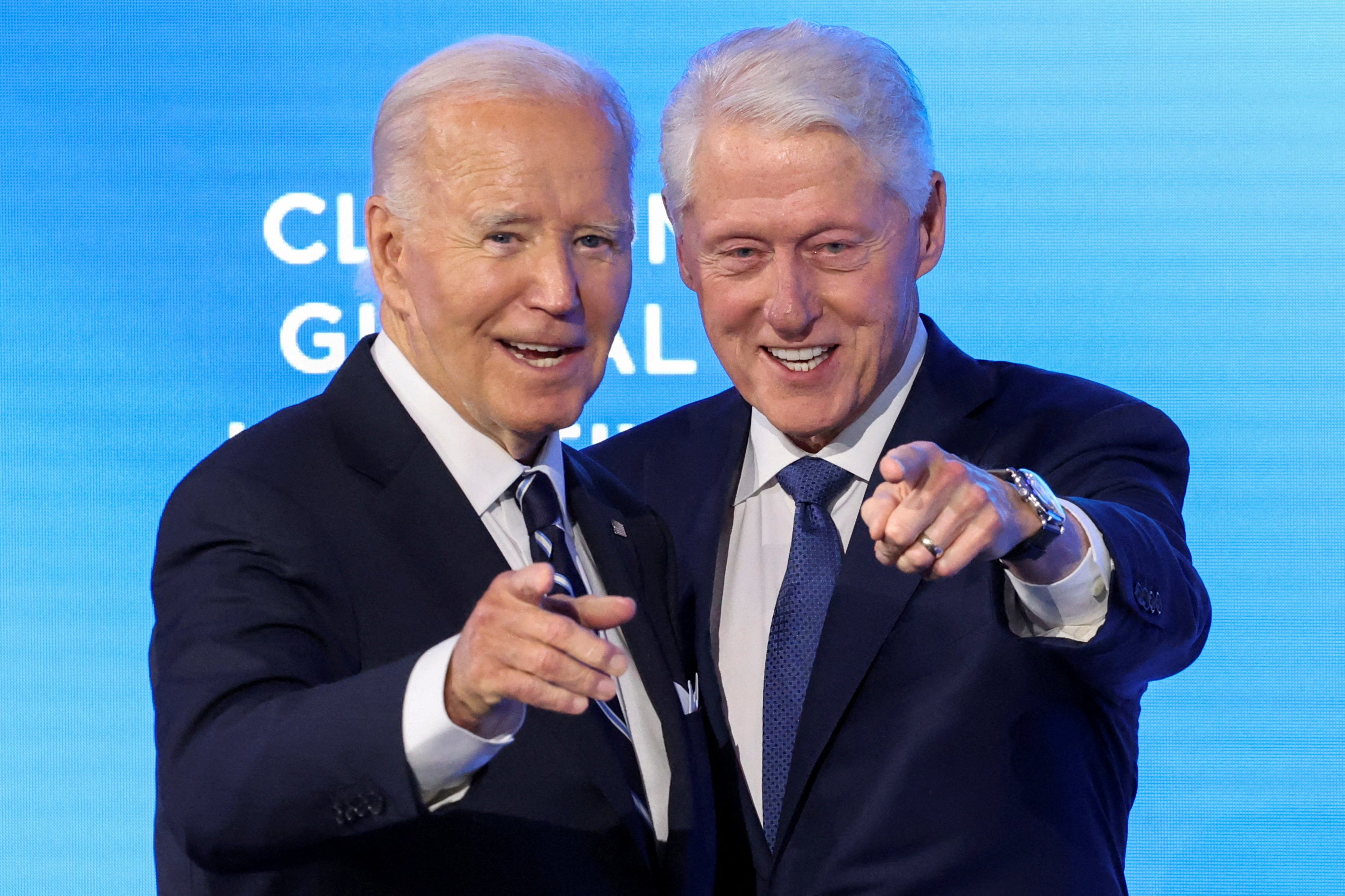 U.S. President Joe Biden and former U.S. President Bill Clinton gesture on the day that Biden is presented with the Clinton Global Citizen Award during the Clinton Global initiative in New York City, U.S., September 23, 2024. REUTERS/Brendan McDermid TPX IMAGES OF THE DAY