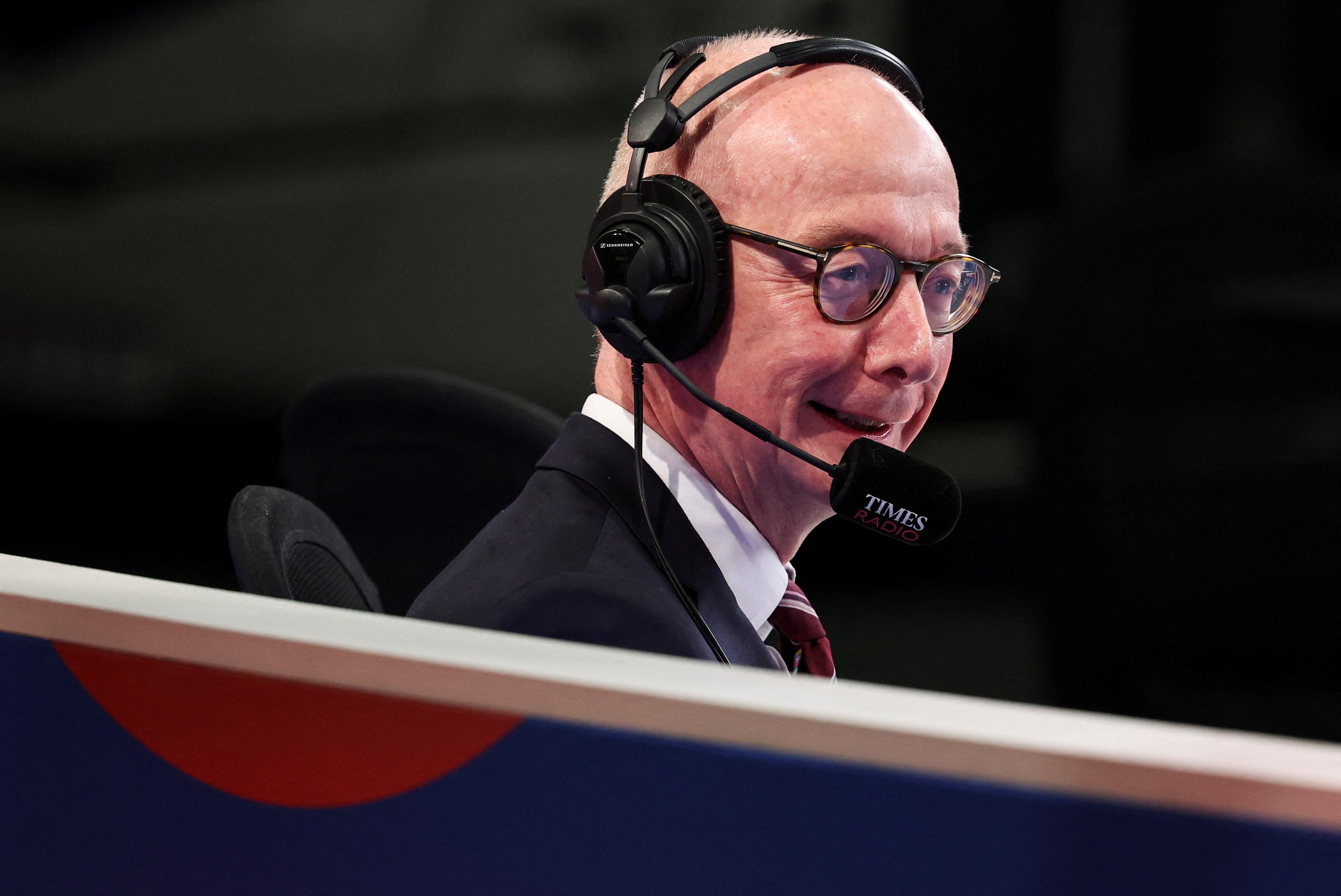 Pat McFadden smiles during a radio interview at Britain's Labour Party's annual conference in Liverpool