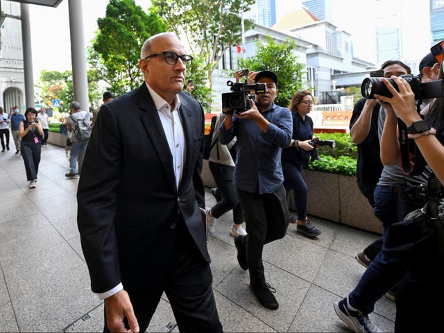 <p>Singapore’s former transport minister S Iswaran arrives at the Supreme Court in Singapore 24 September 2024</p>