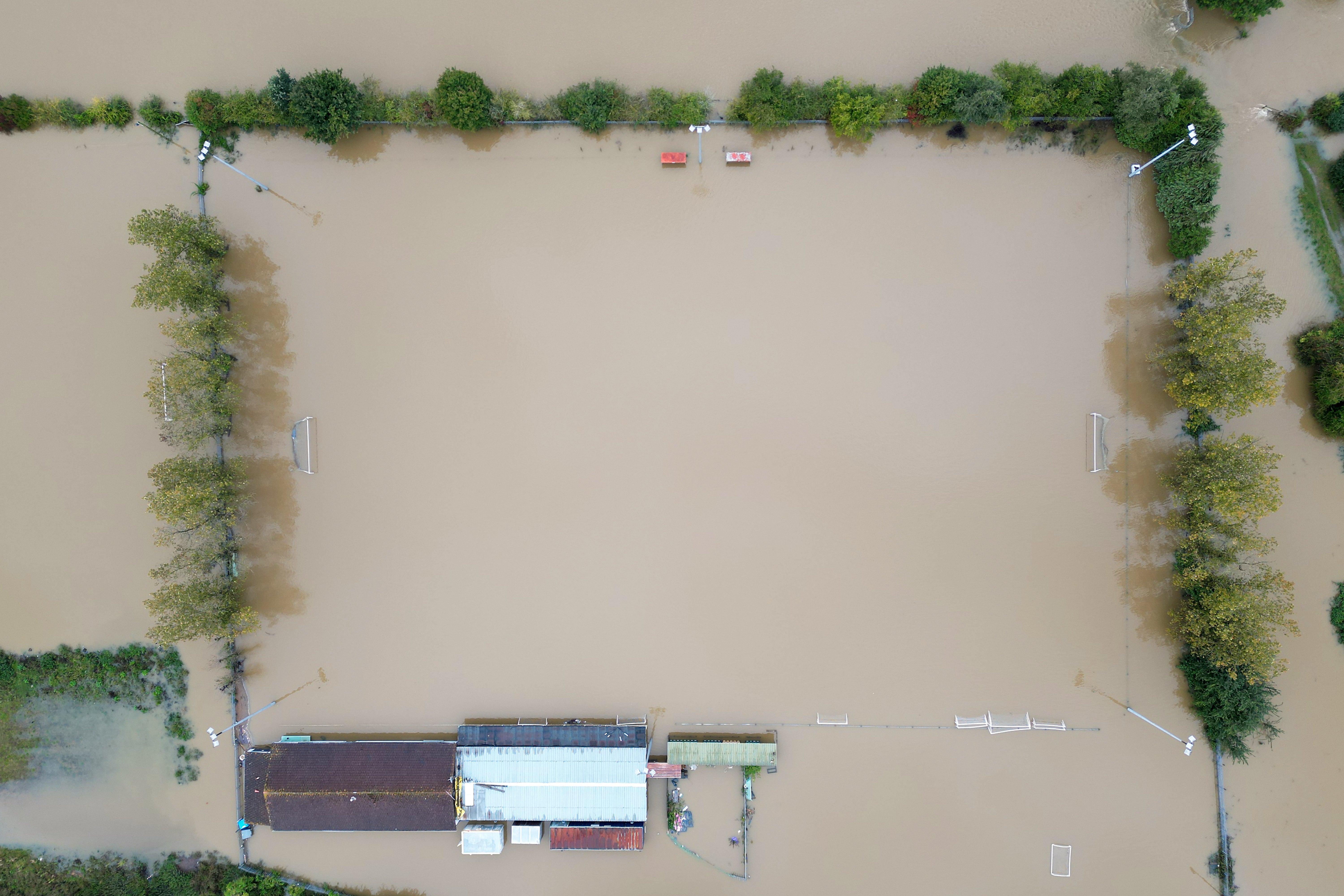 Floodwater submerges Spencer Football Club in Northampton.