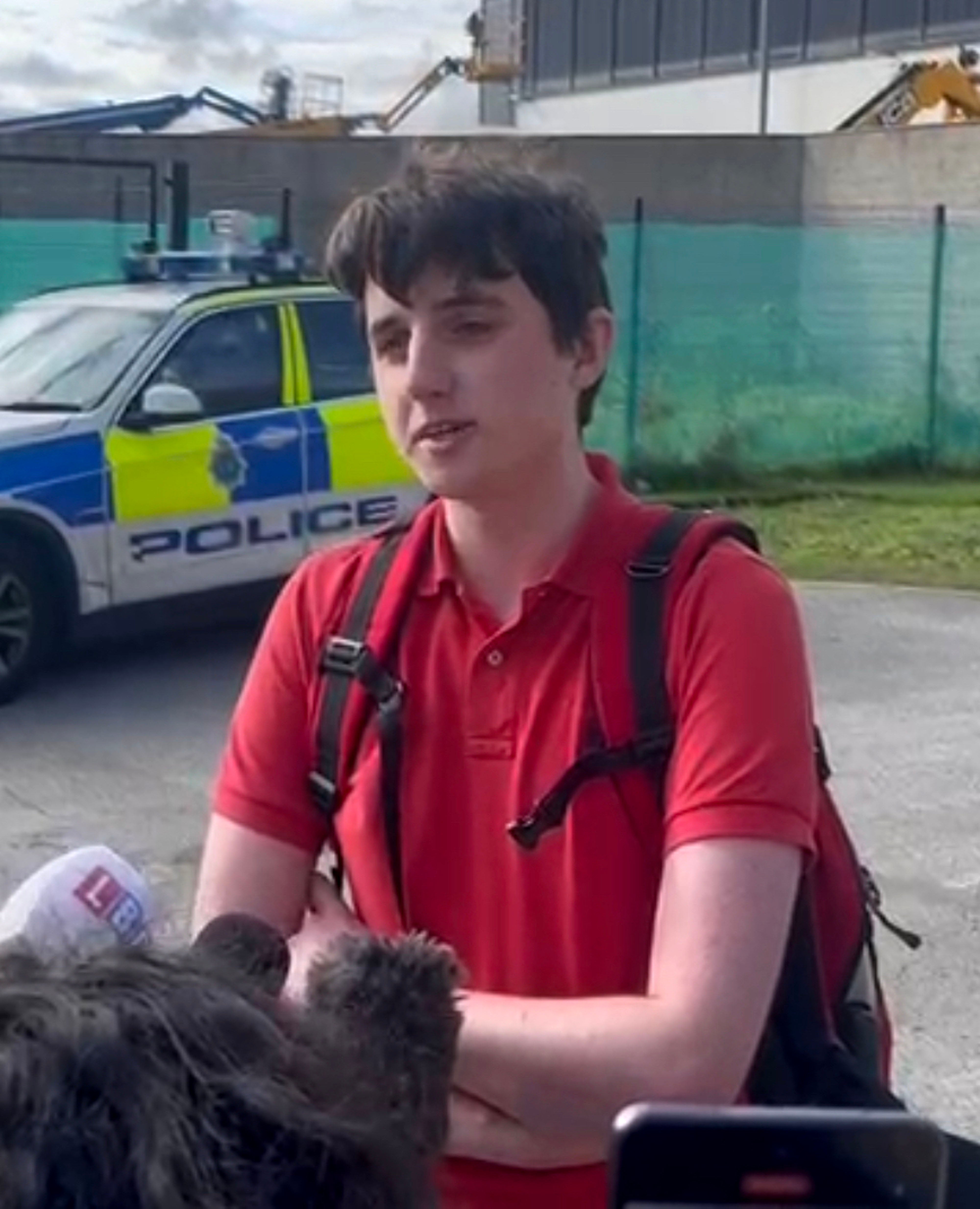 Student Daniel Riley, 18, who heckled the Prime Minister during his speech, speaking to the media outside the ACC in Liverpool