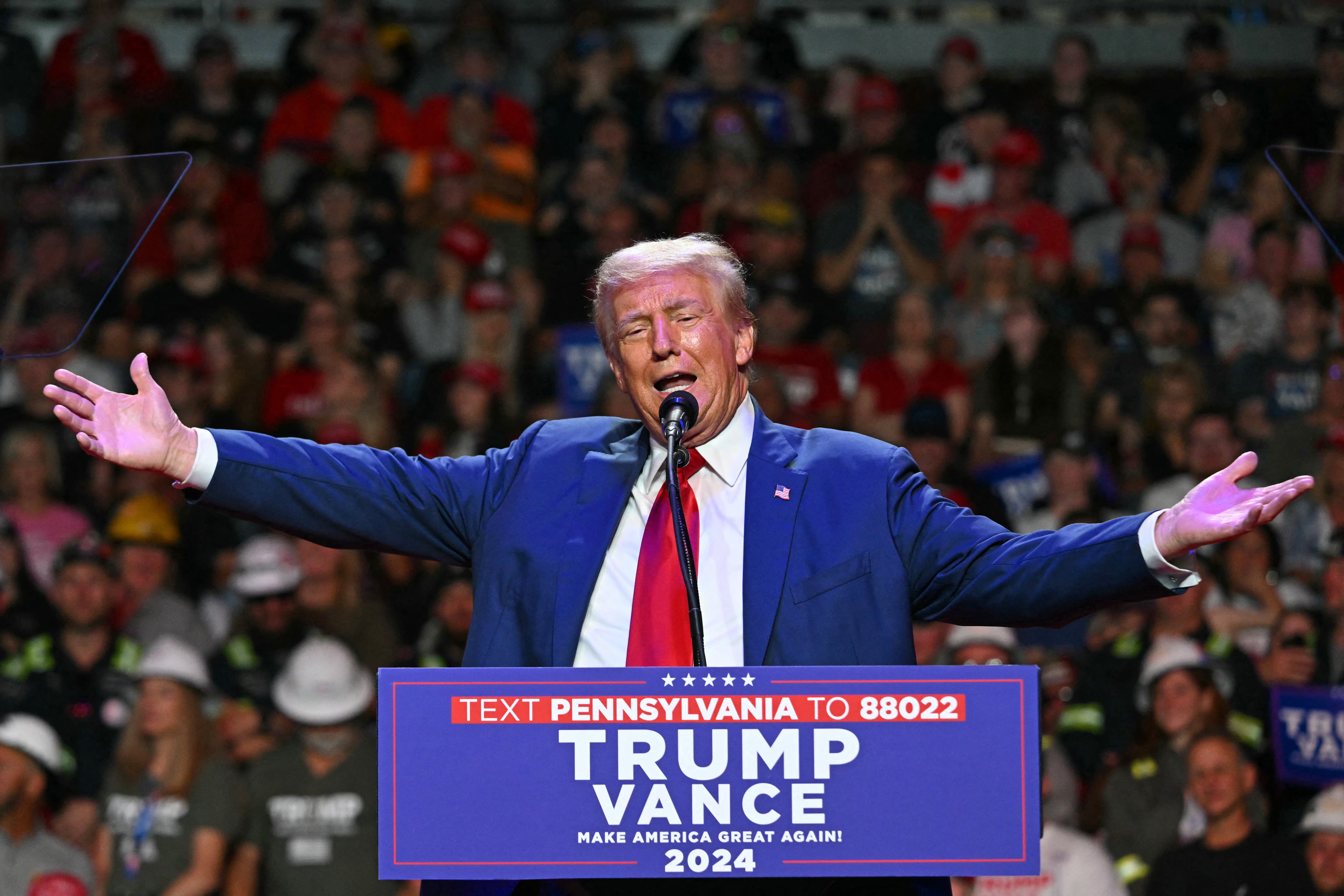 Former US President and Republican presidential candidate Donald Trump speaks during a campaign rally at Ed Fry Arena in Pennsylvania. Former state Republican party chairs in Maine have now endorsed his rival