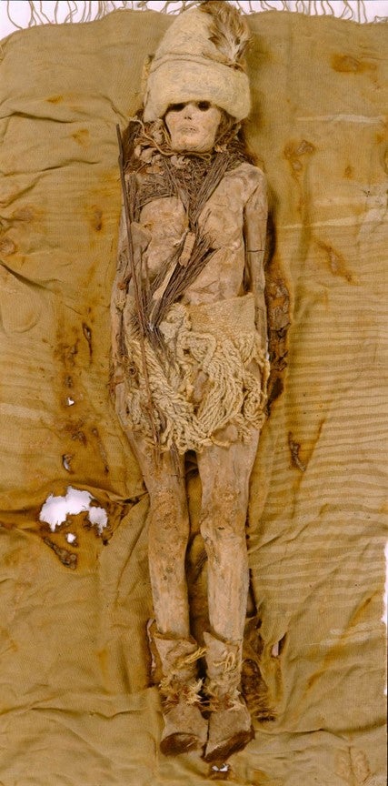 A Tarim mummy found in the Xinjiang region of northwestern China. Scientists say the world’s oldest cheese was found smeared on the mummies’ heads and necks.