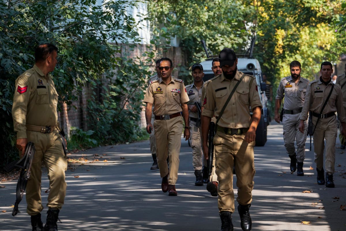 Residents in India-controlled Kashmir vote in the second phase of polls surrounded by heavy security