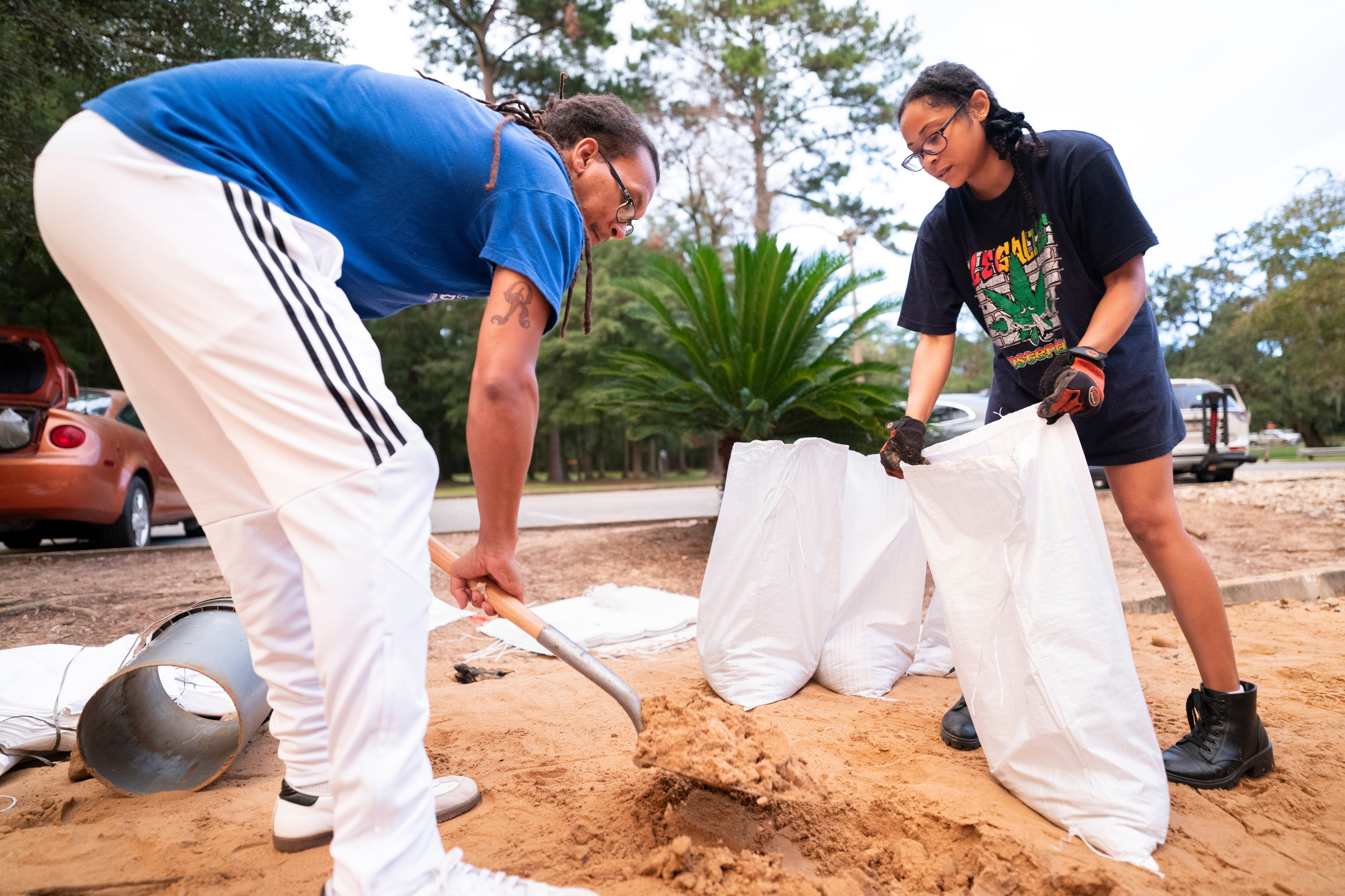 Tallahassee residents prepare sandbags for Hurricane Helene. The storm could be the strongest to ever hit the city, Mayor John Dailey said