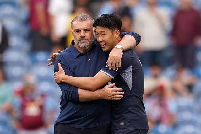 Tottenham boss Ange Postecoglou and Son Heung-min (Nick Potts/PA)