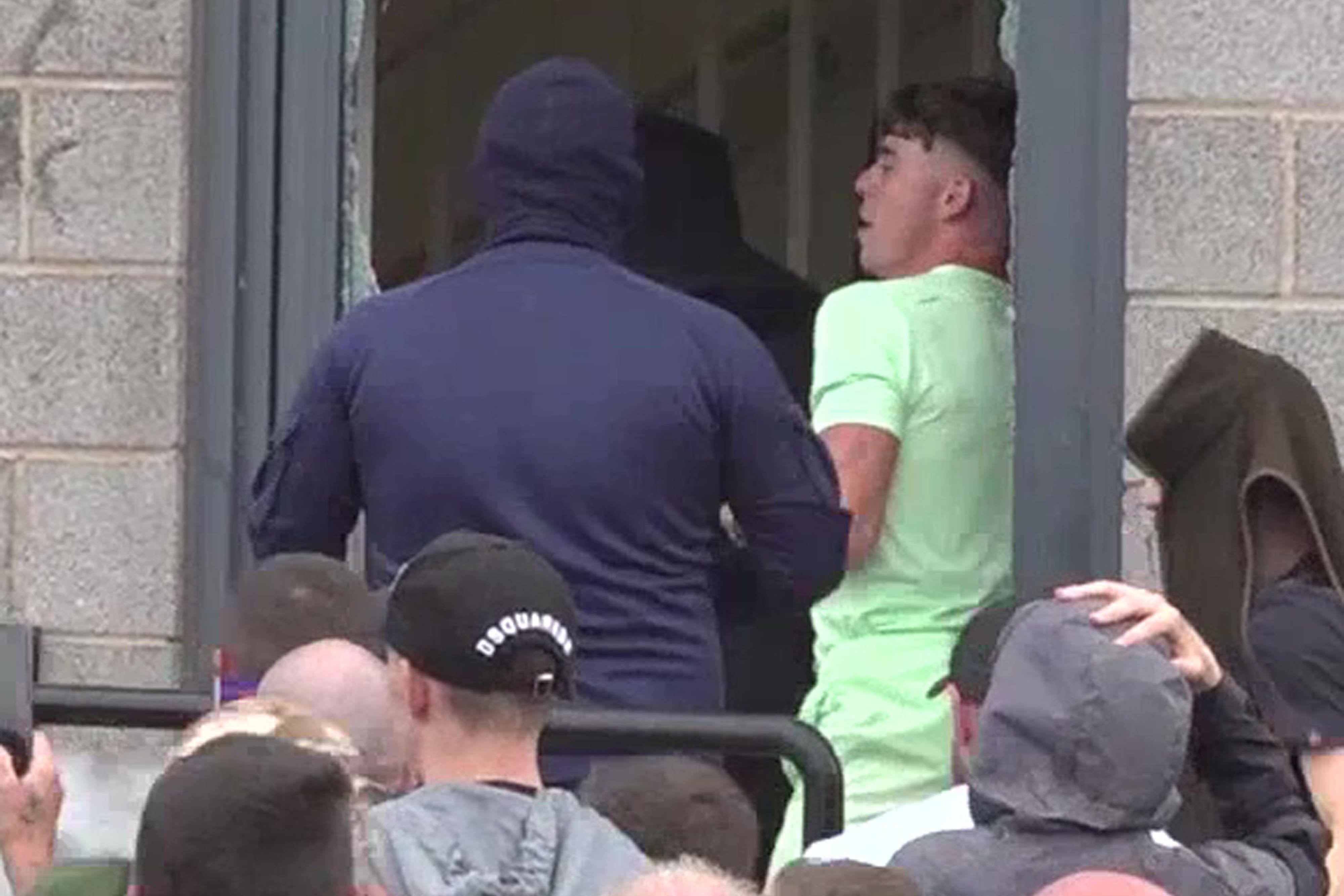 Ashley Williams (centre right) entering the Holiday Inn Express in Manvers, Rotherham (Jamie Lashmar/PA)