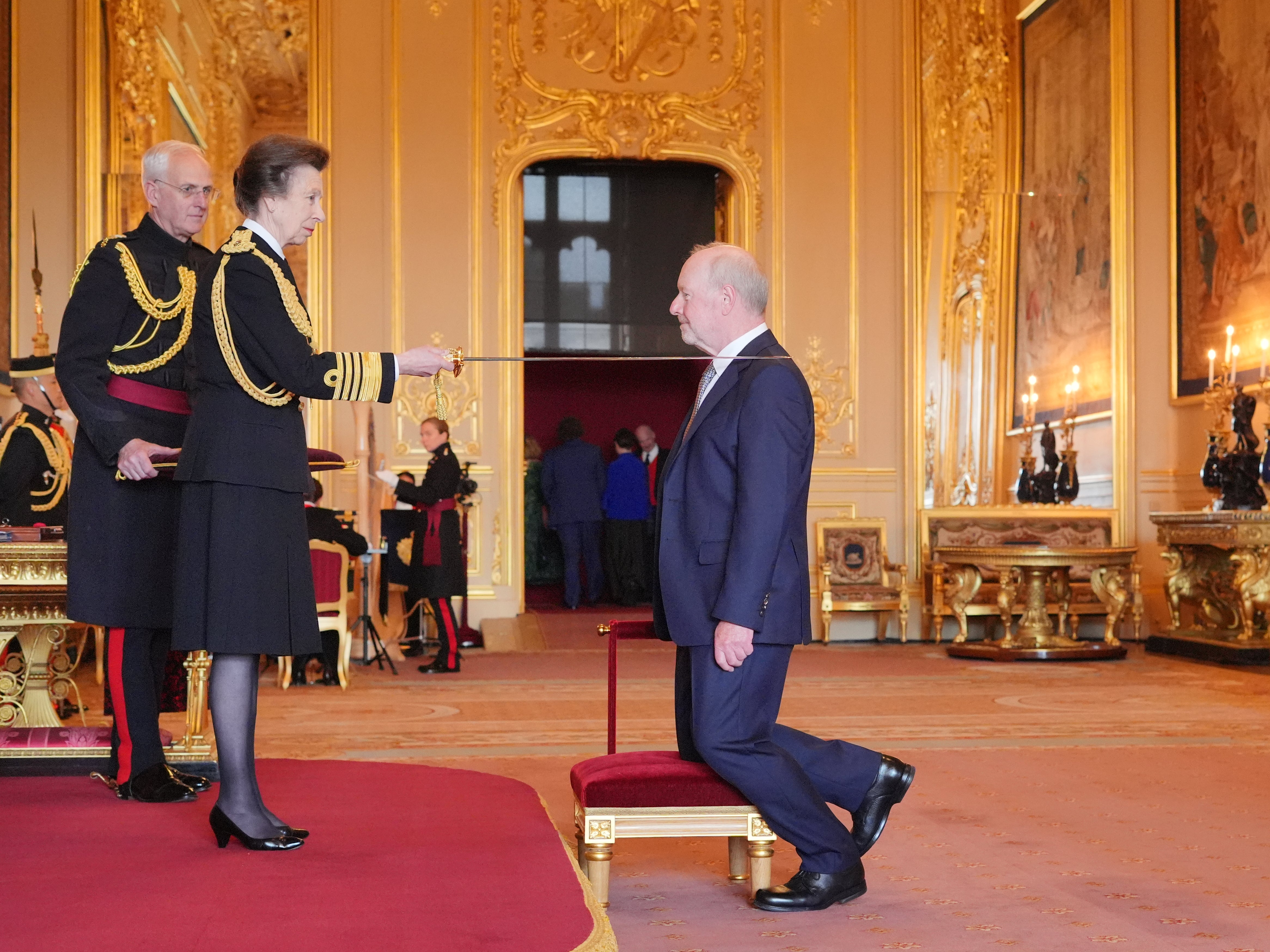 Sir Alan Bates was knighted by Princess Anne